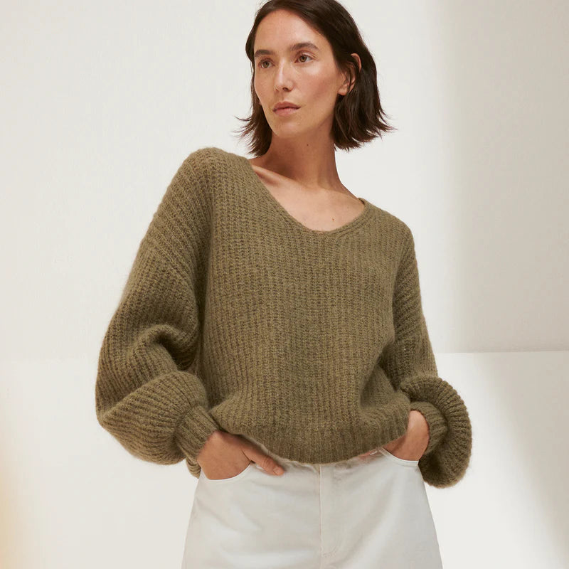 Nanso green Karamelli knit worn by woman