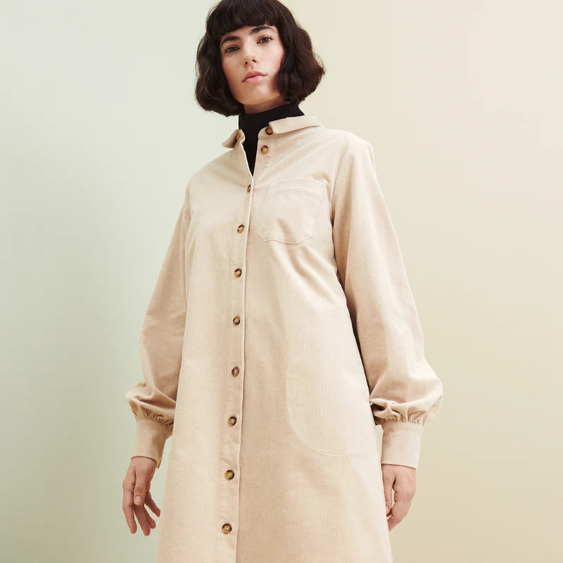 Nanso dress in beige velvet worn by woman