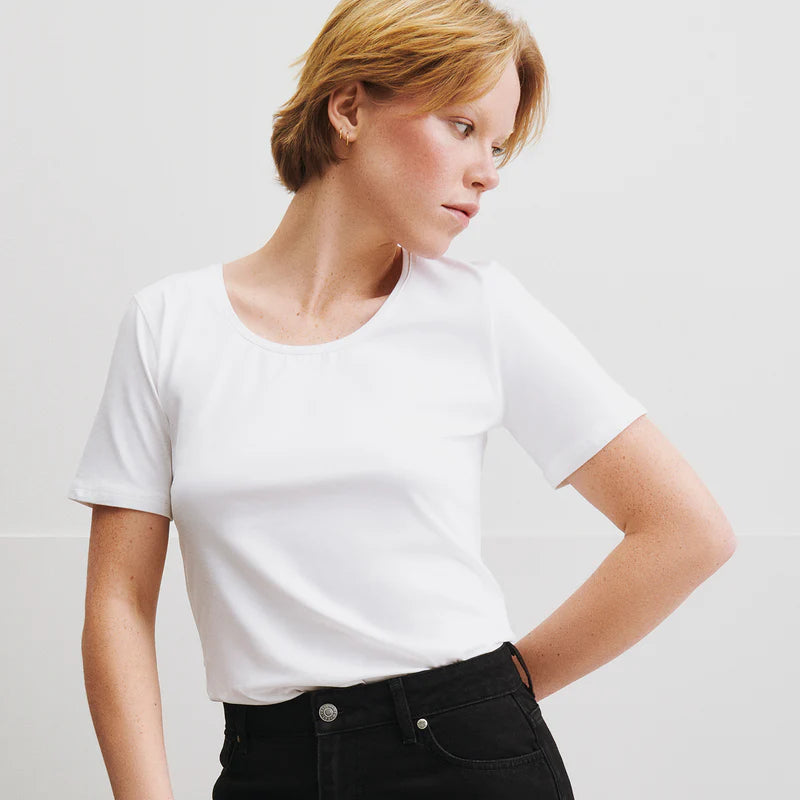 Nanso white Basic t-shirt and black jeans worn by woman