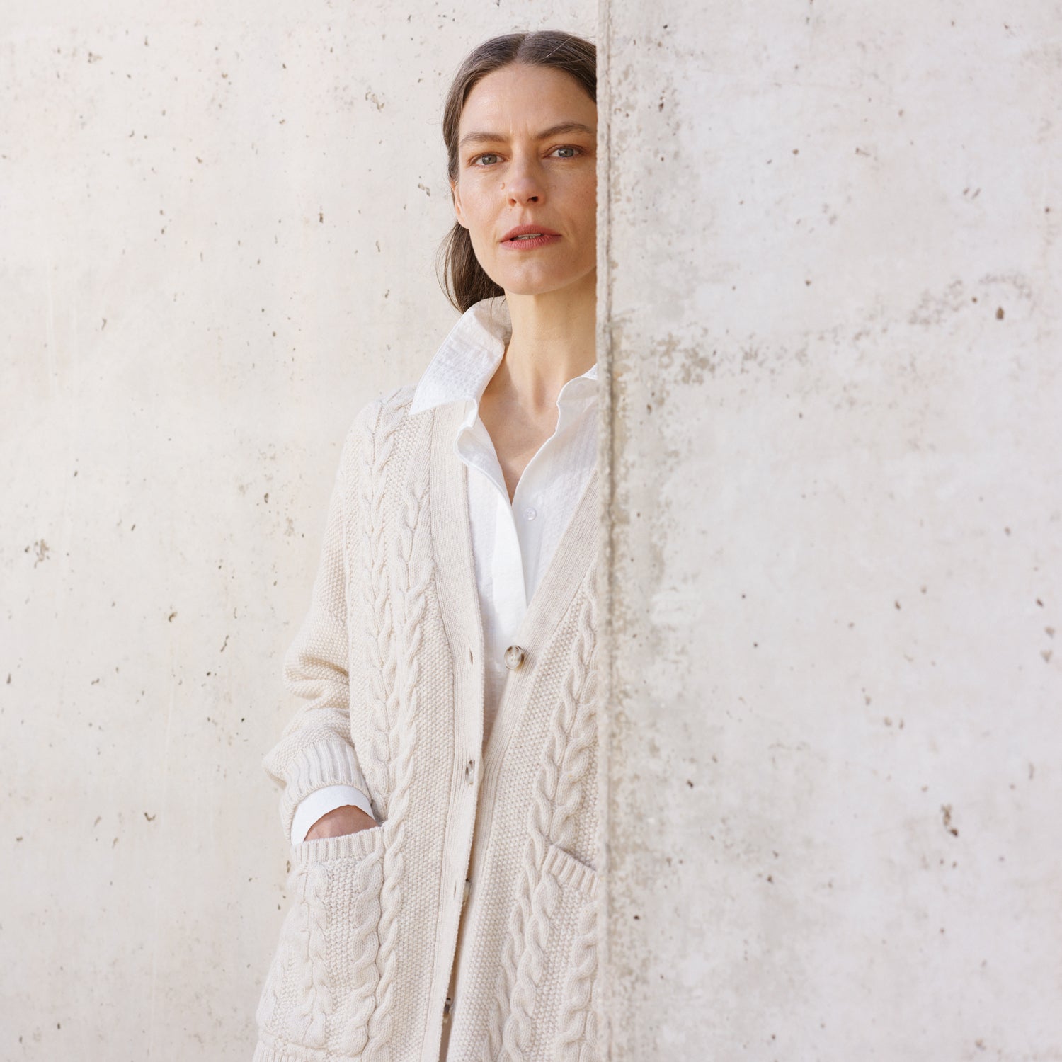 Nanso Palmikko knitted cardigan on model from front