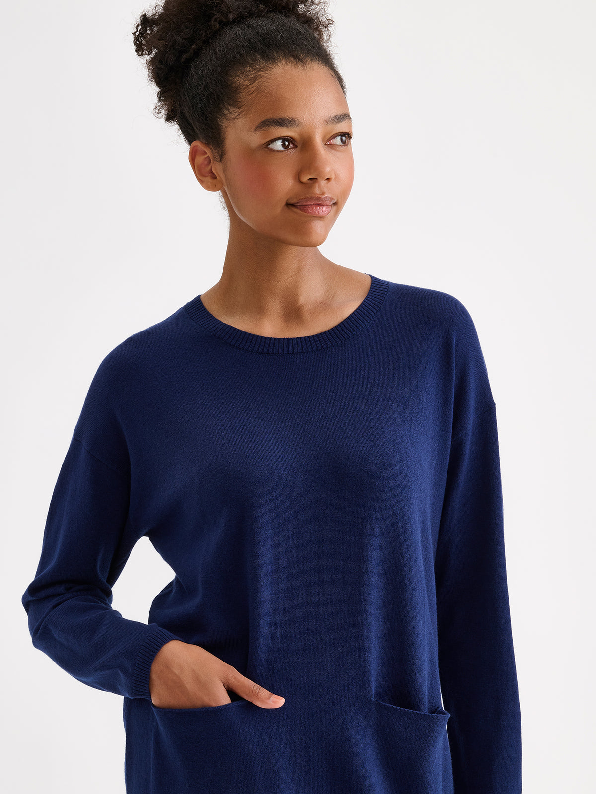 Nanso women's elegantly simple Villis knit tunic on a model.