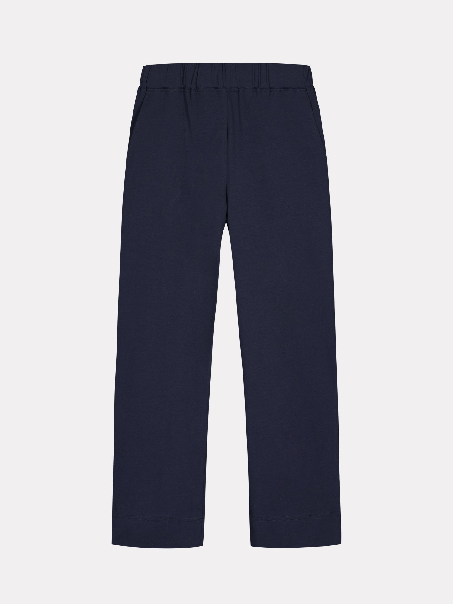 Ladies' Basic 7/8 dark blue jersey bottoms with a comfortable elastic band at the waist, side pockets and small side slits at leg openings. Product image from the front.