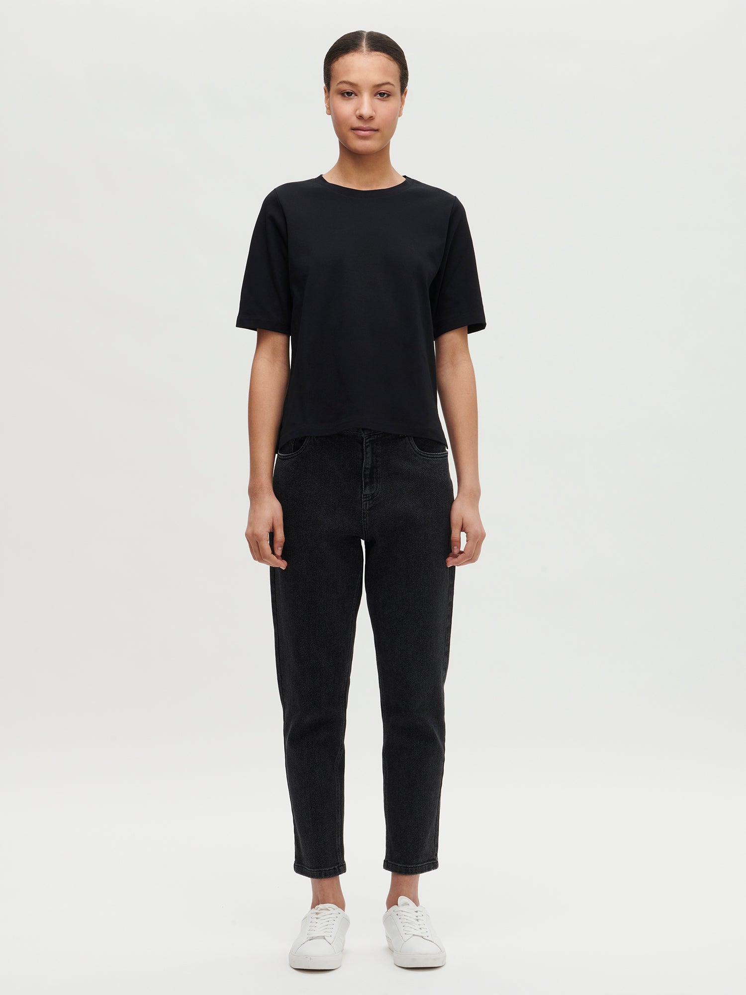 Nanso women’s black loose fit T-shirt from 100 % cotton.