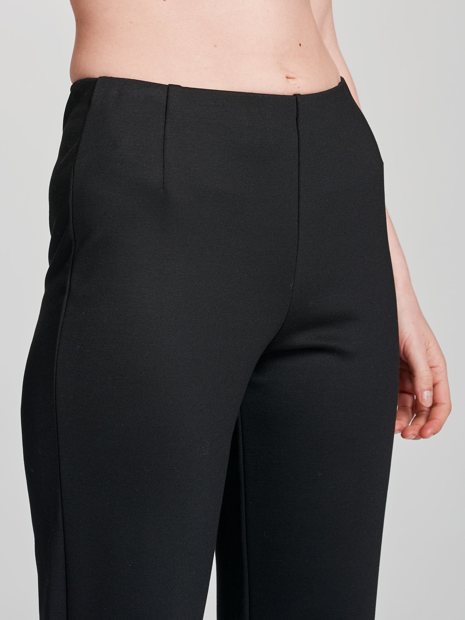 Nanso women's black Assi trousers, close-up.