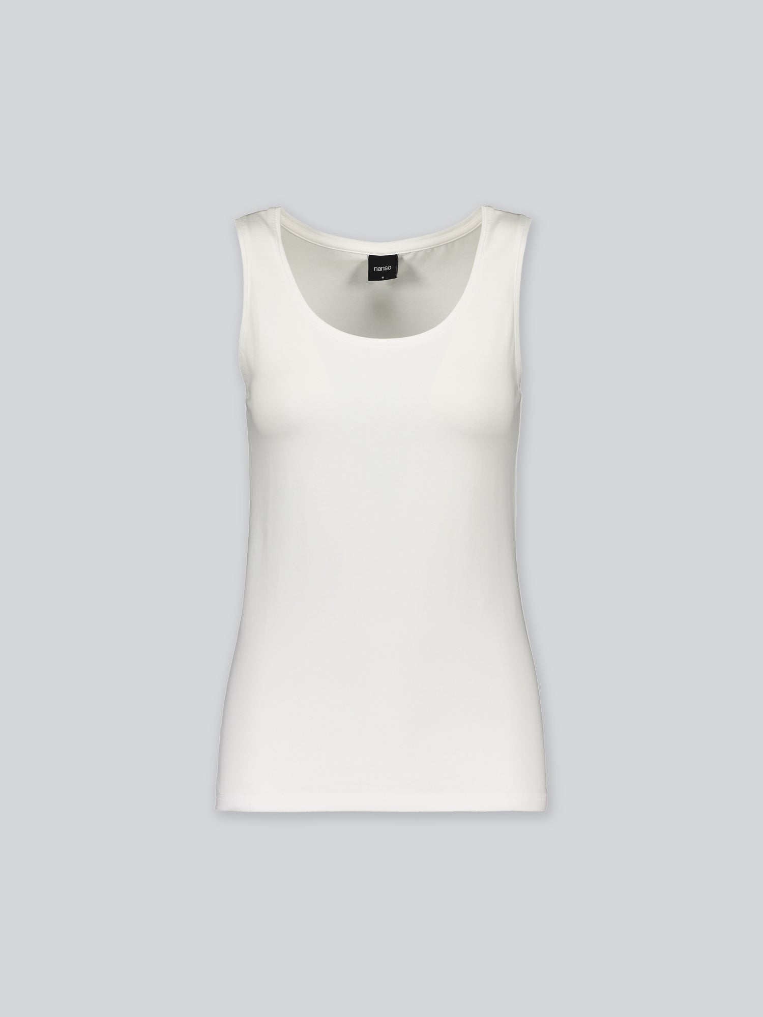 Nanso women's white Basic top with comfortable wide straps and a timeless silhouette. Crafted from soft, stretchy organic cotton-elastane knit. Product image.