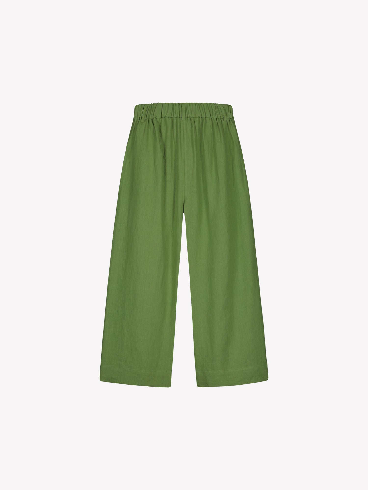 Nanso SAARI linen culottes with elasticated waist and side pockets in a vibrant green shade in a product picture.