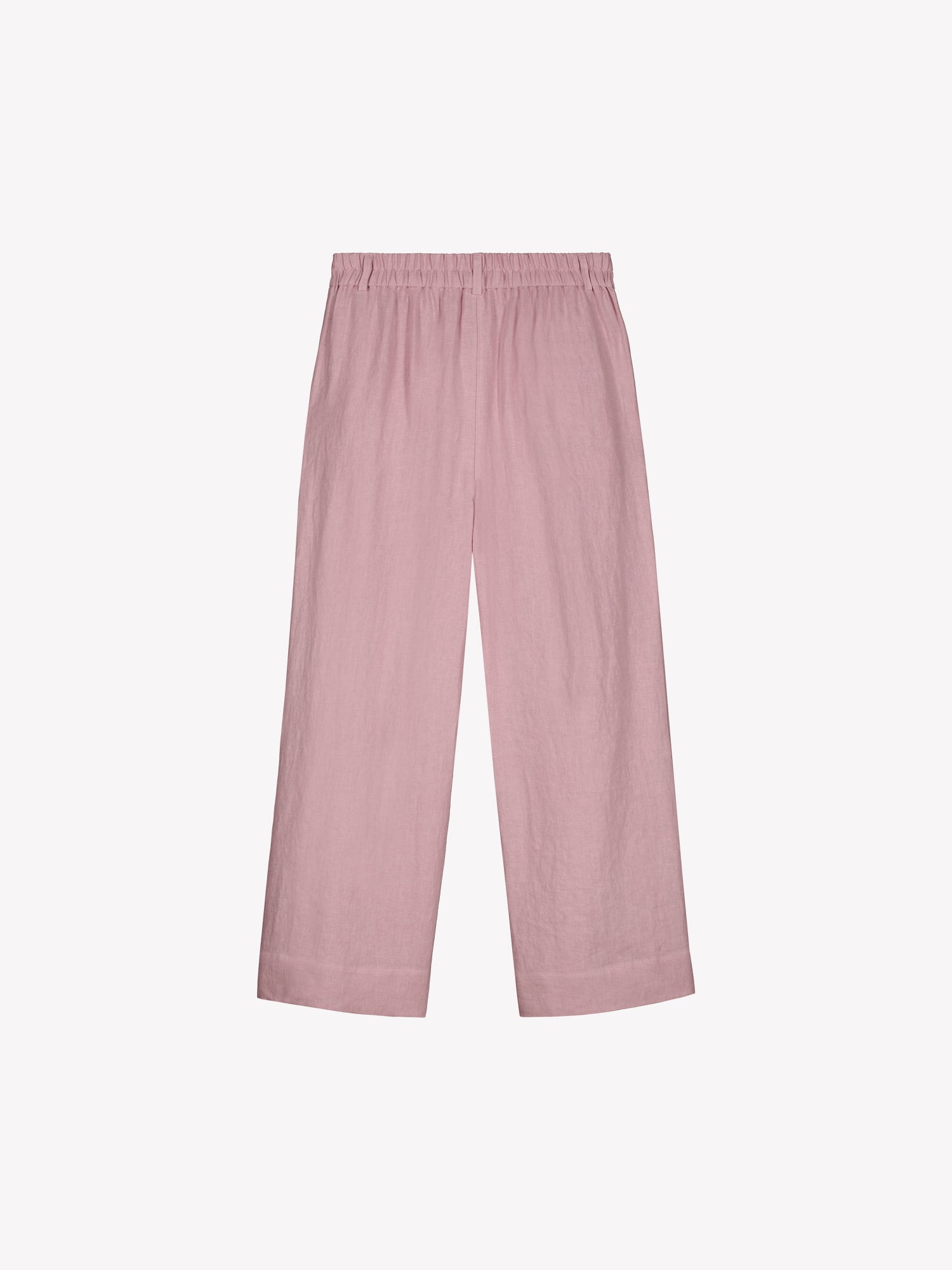 Nanso SAARI linen culottes with elasticated waist and side pockets in a sophisticated lilac shade in a product picture from the backside.