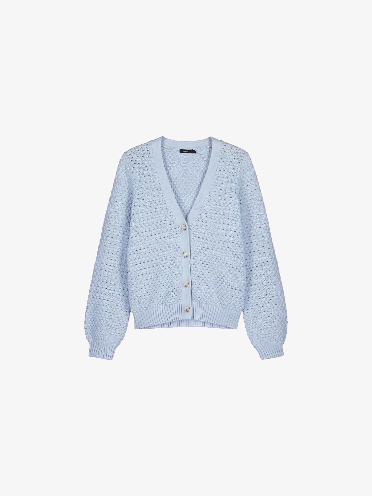 This women's KUMPU Knit Cardigan in Light Blue in a product picture