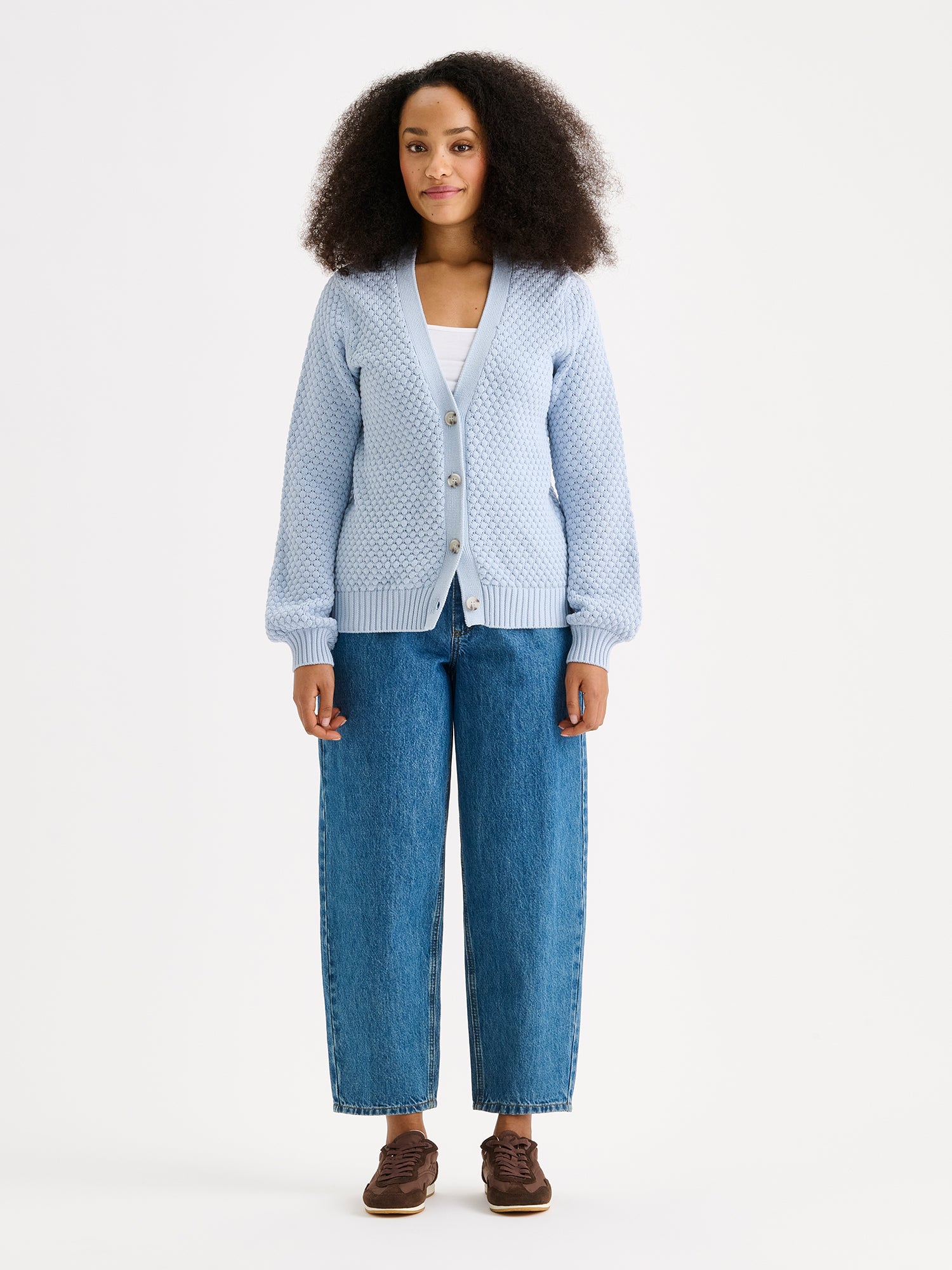 women's KUMPU Knit Cardigan in Light Blue on a model with jeans