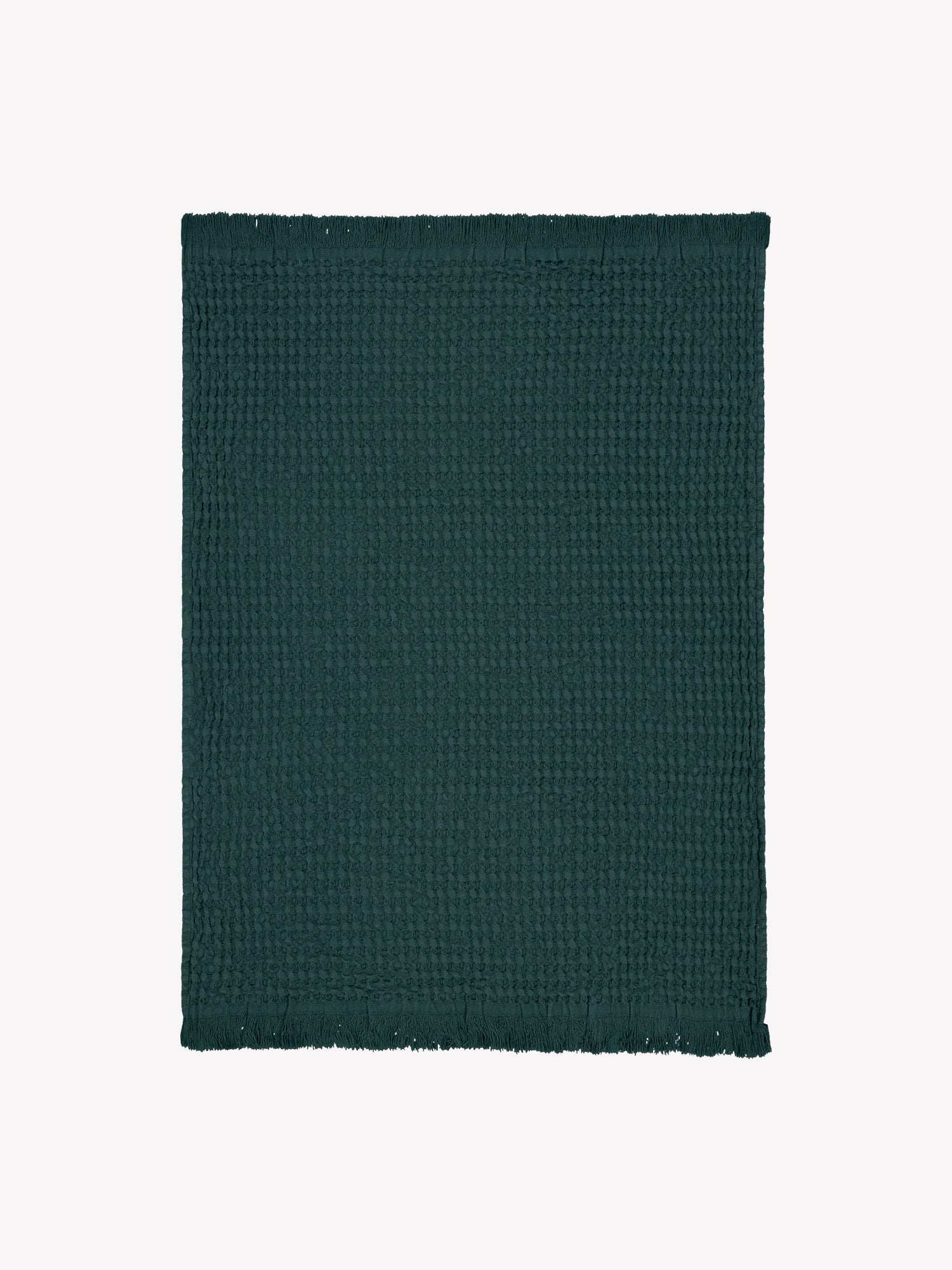 Vohveli hand towel in beautiful dark green offers a perfect blend of the nostalgic waffle fabric and modern design. Product picture