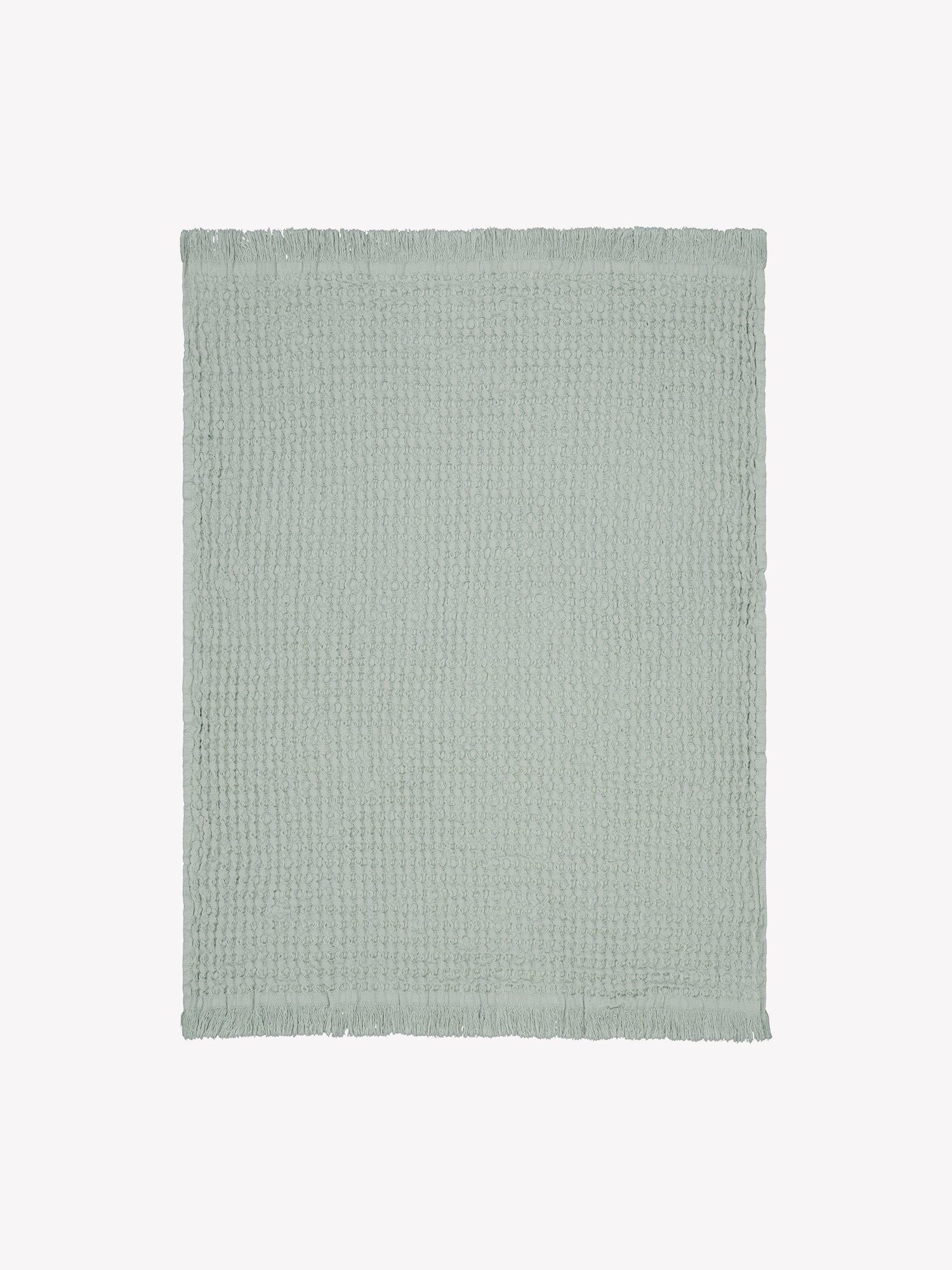 Vohveli hand towel in beautiful light green offers a perfect blend of the nostalgic waffle fabric and modern design, product picture