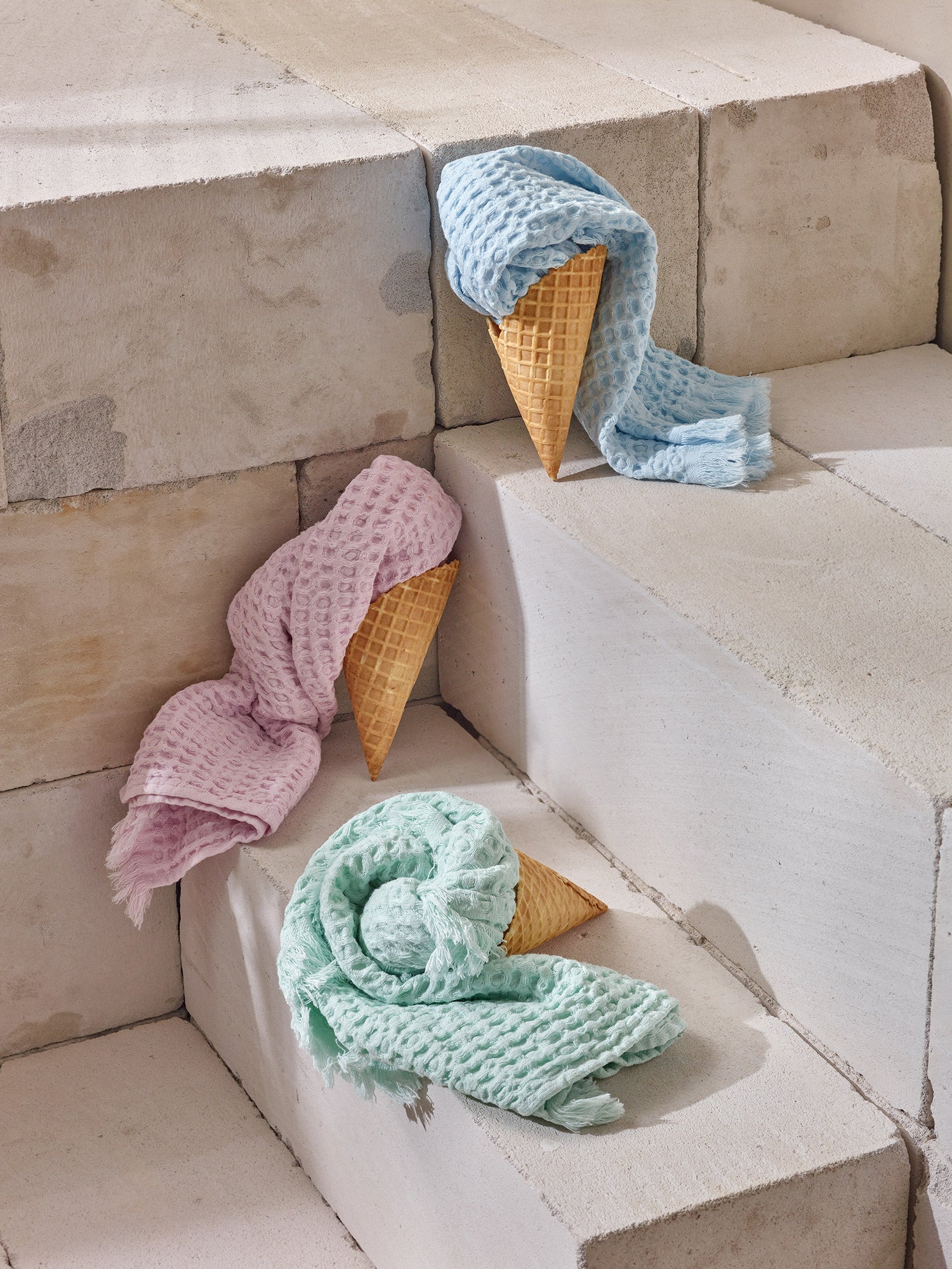 Nanso's pastel coloures Vohveli hand towels in a beutiful setting with the towels in ice cream cones.
