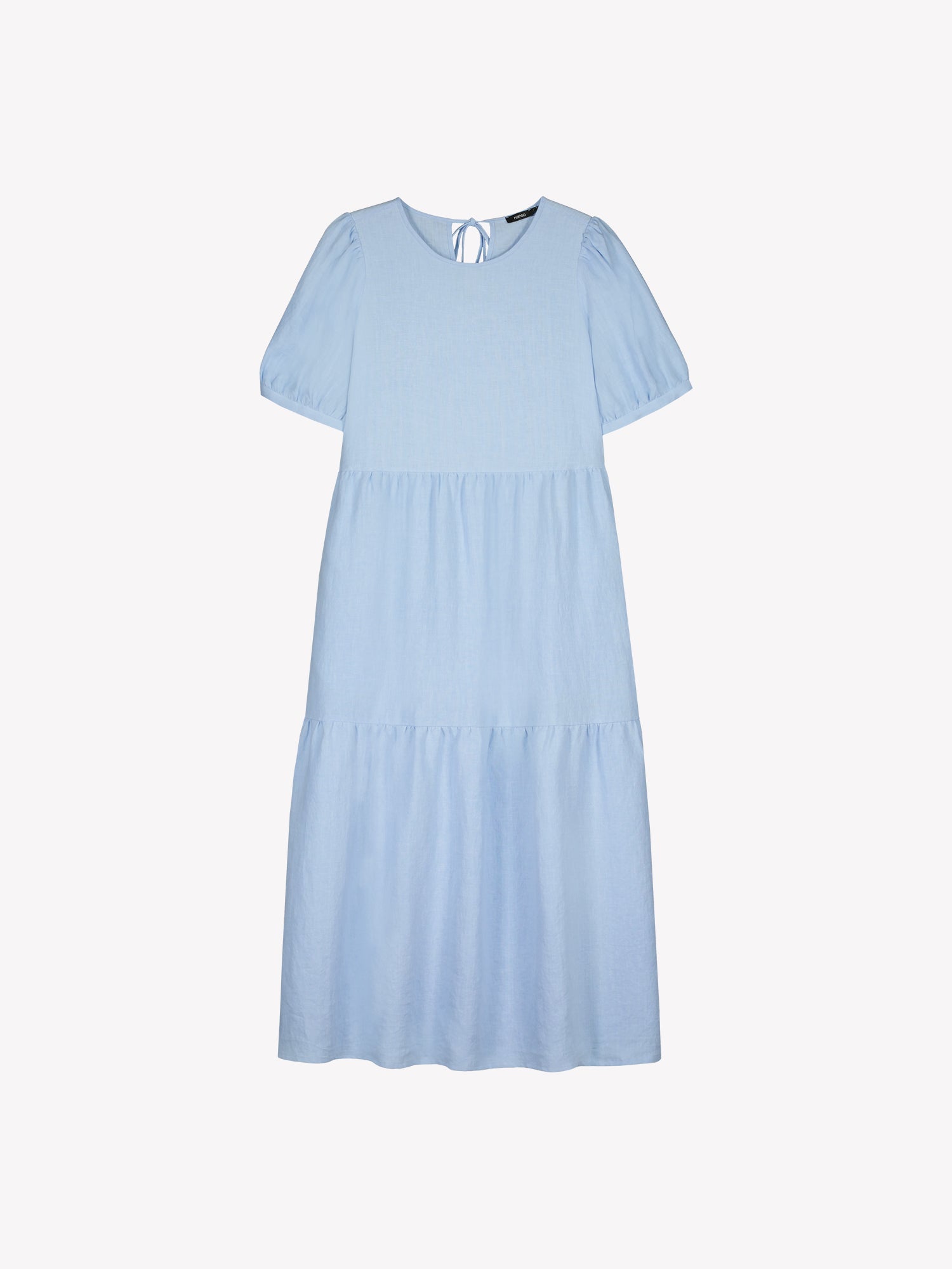 The Sarastus long soft light blue dress for women is made of high-quality, durable, and breathable woven linen fabric. With its voluminous frill layers and short puff sleeves, this dress exudes both elegance and comfort. In a product picture.