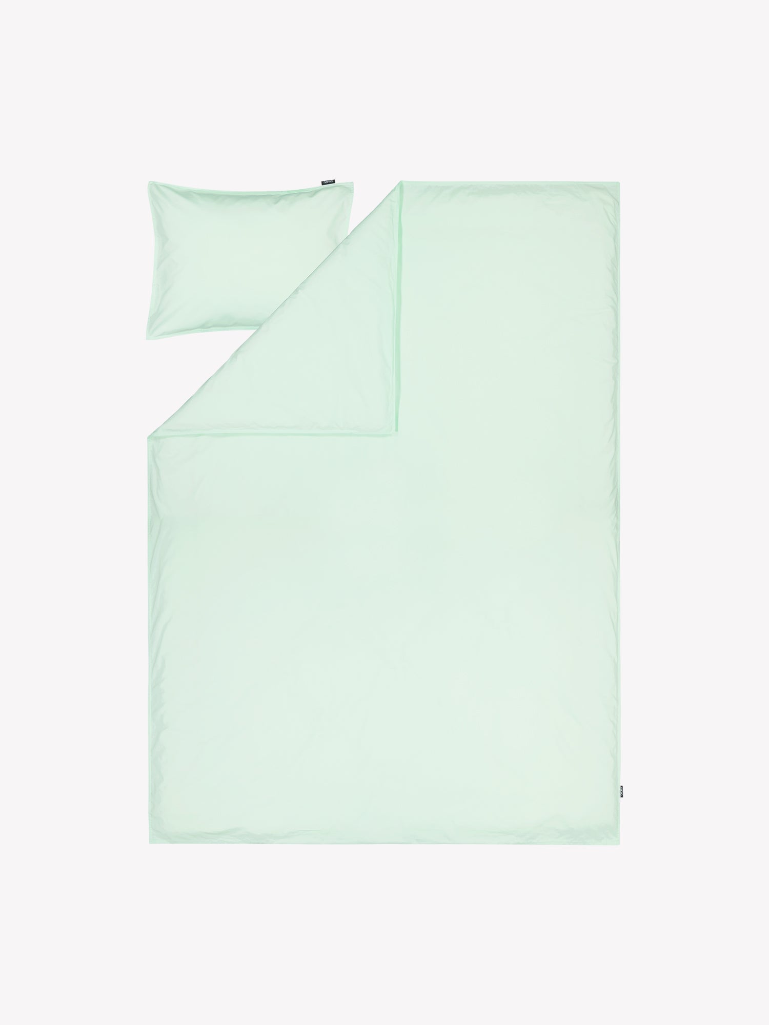 Nanso's Uni Duvet Cover Set in mint in a product picture.