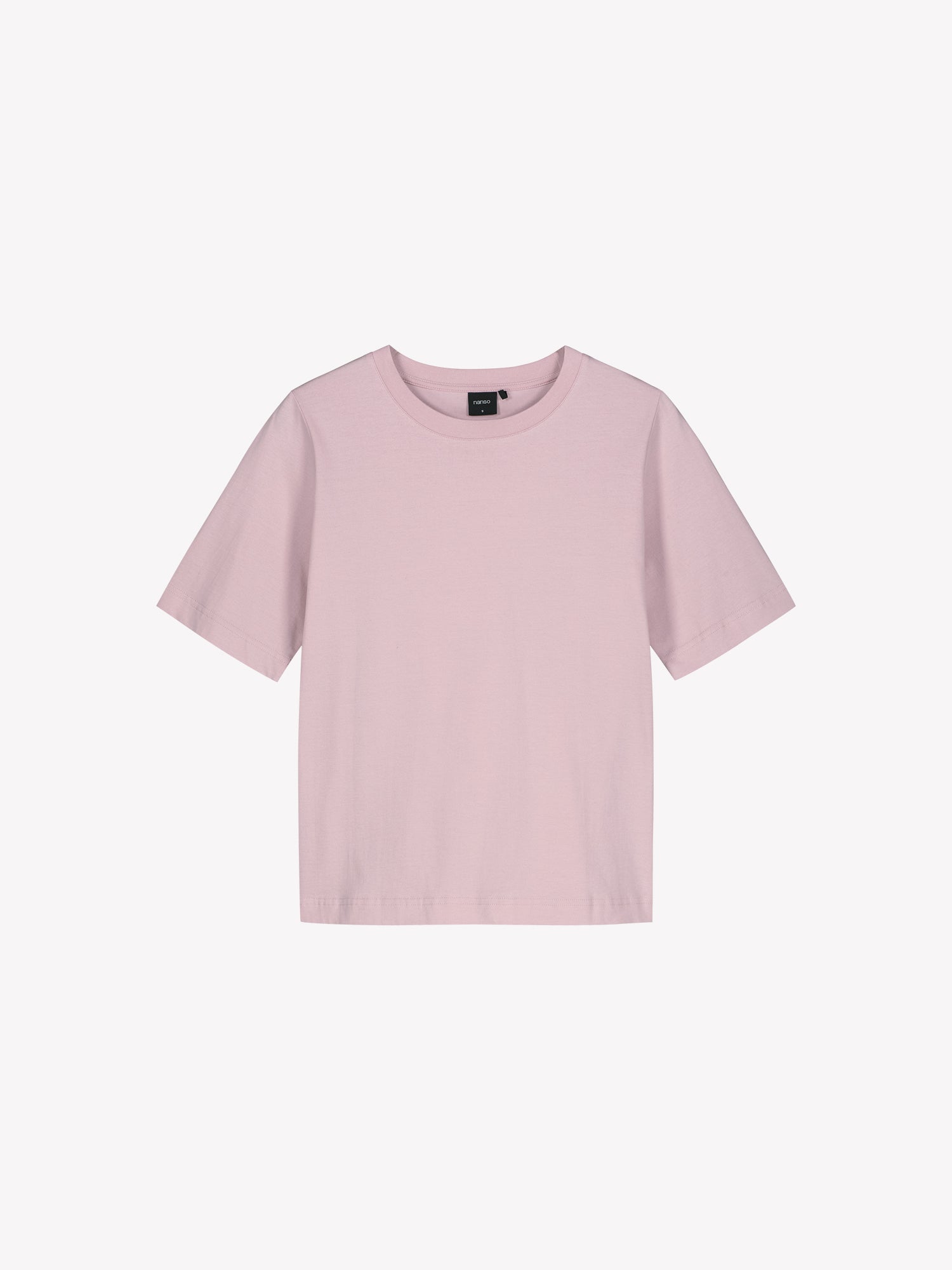 Women's Normi T-shirt in Pink with relaxed fit and straightforward silhouette. The material is 100% high-quality organic cotton, which maintains its quality over time. Product picture from the front.
