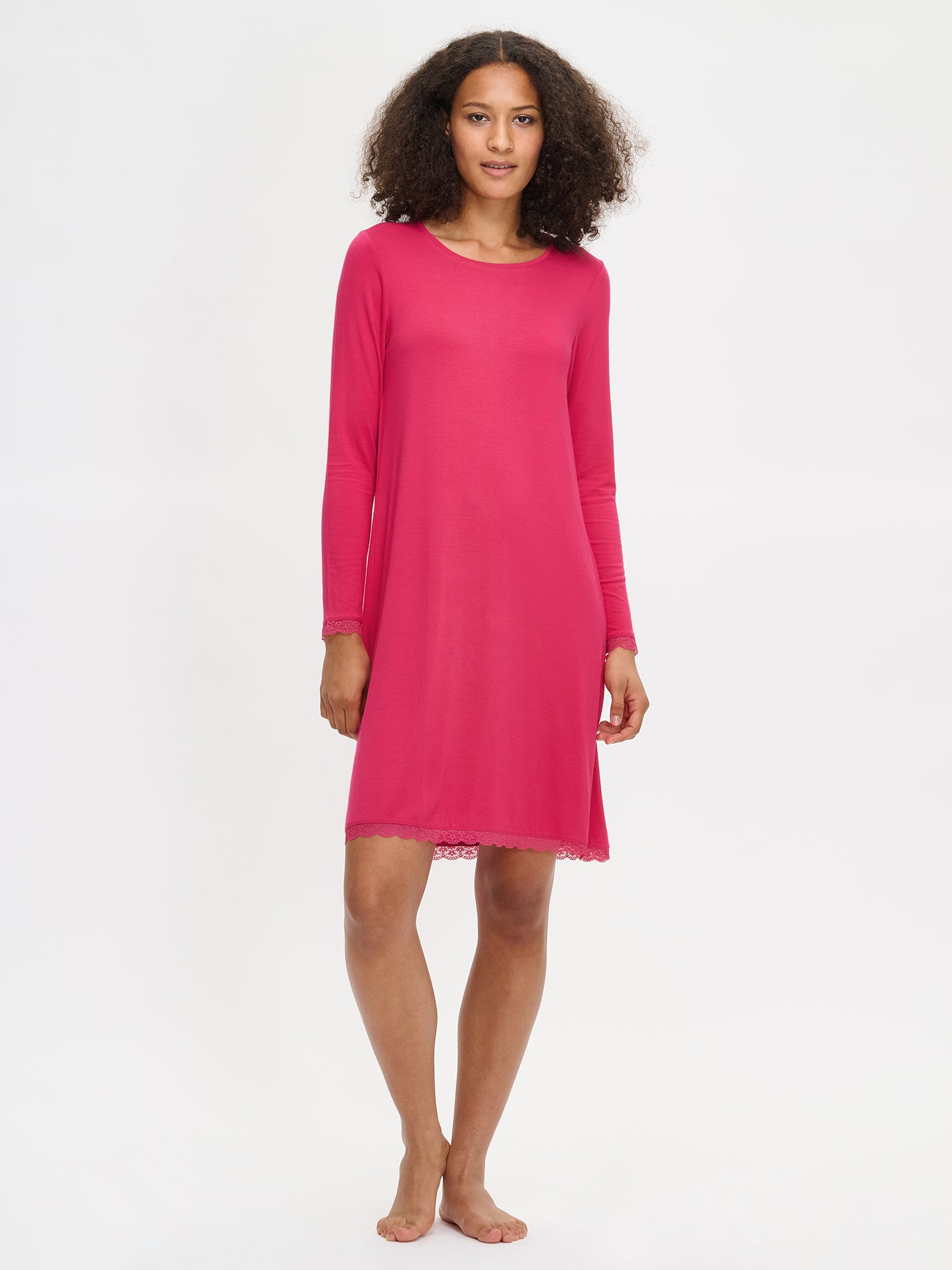 Pink Pitsi nightgown with long sleeves and a round neckline on a model.