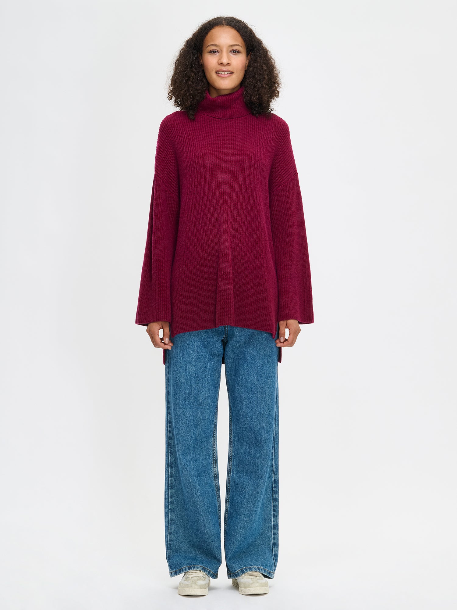 Nanso's relaxed burgundy Pamela knit tunic, front