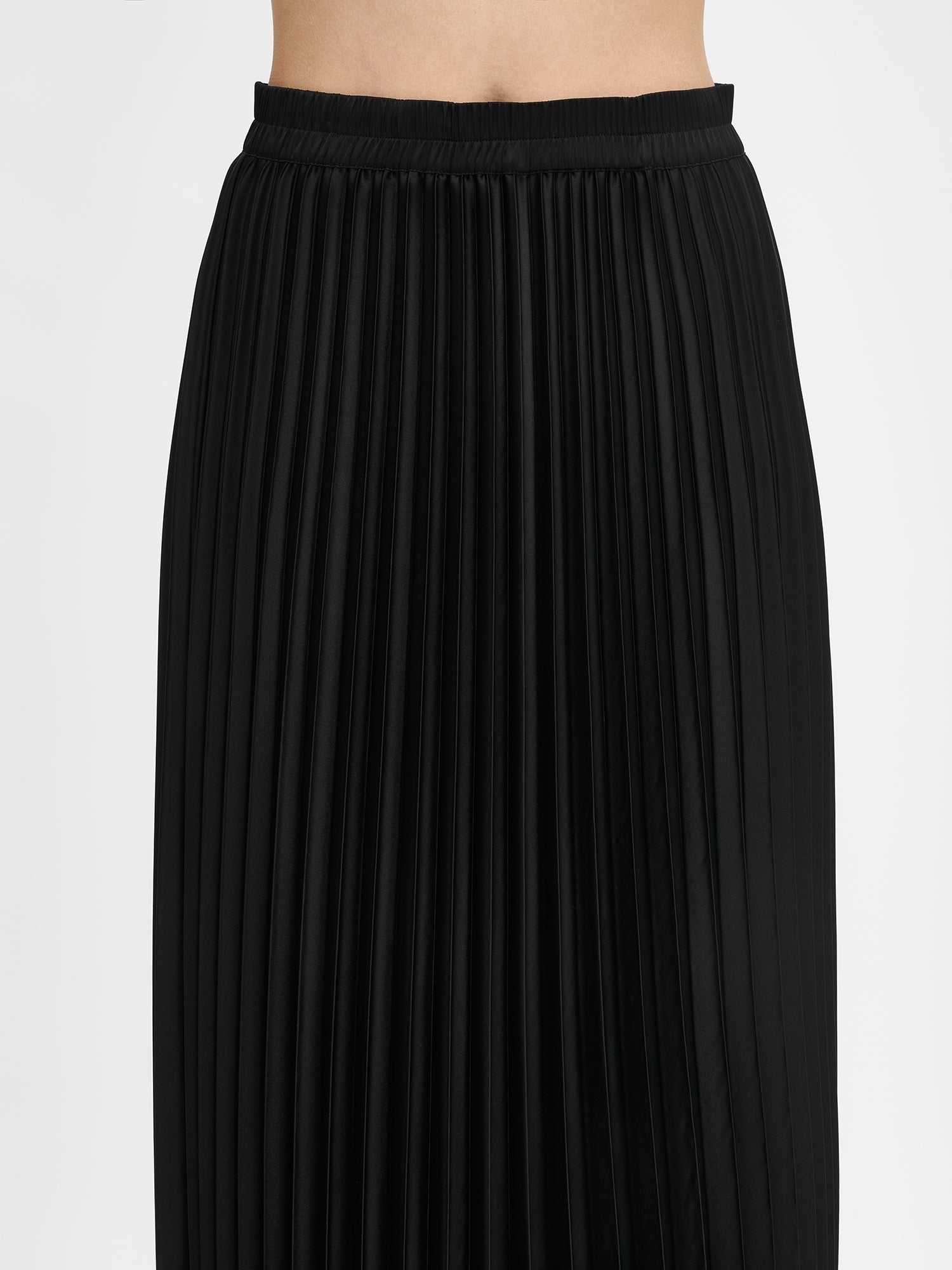 Nanso's elegant Taite skirt for women features a graceful drape in a classic black