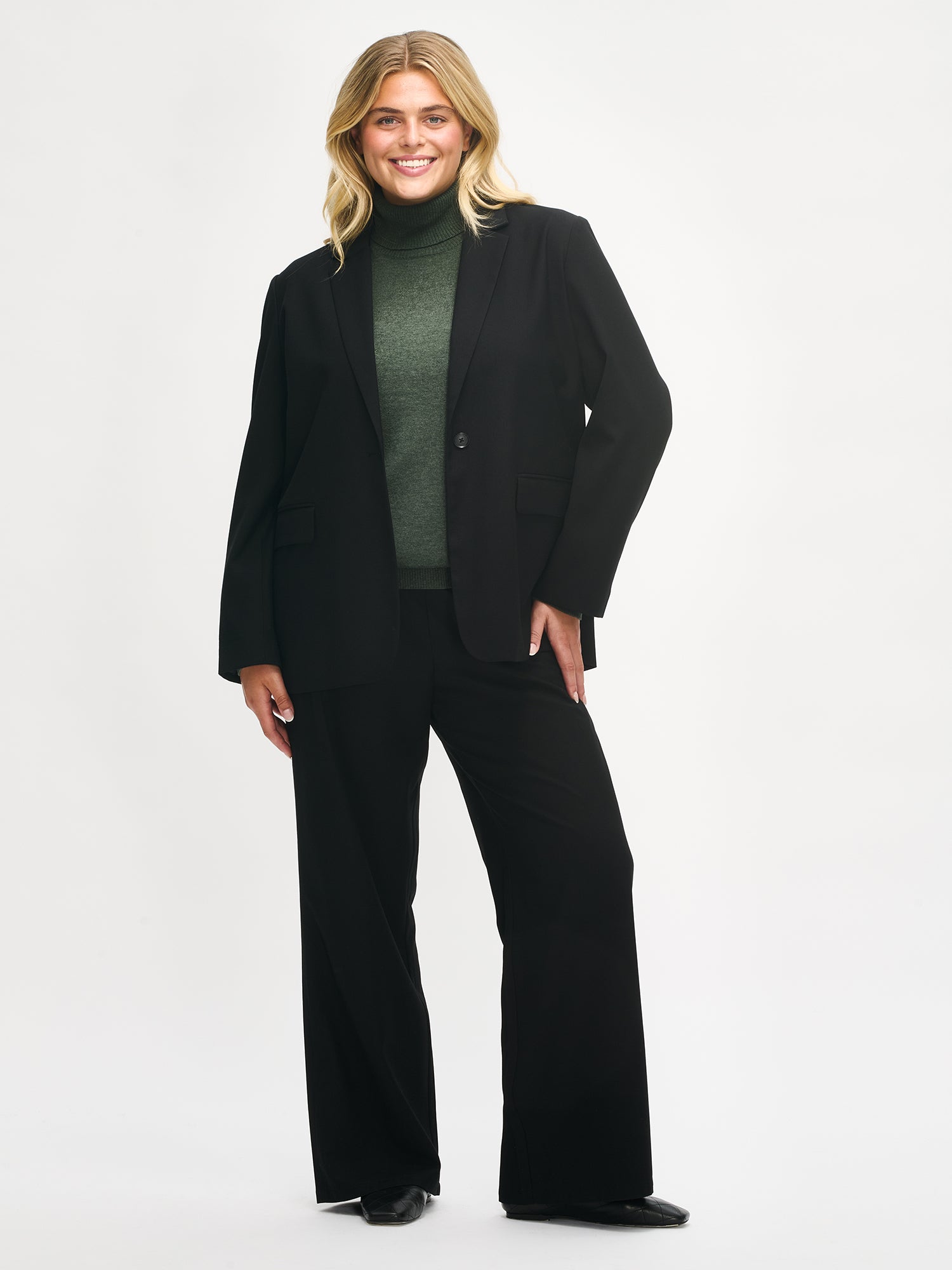 Nanso's black Bea blazer is a timeless and elegant wardrobe essential for women, front