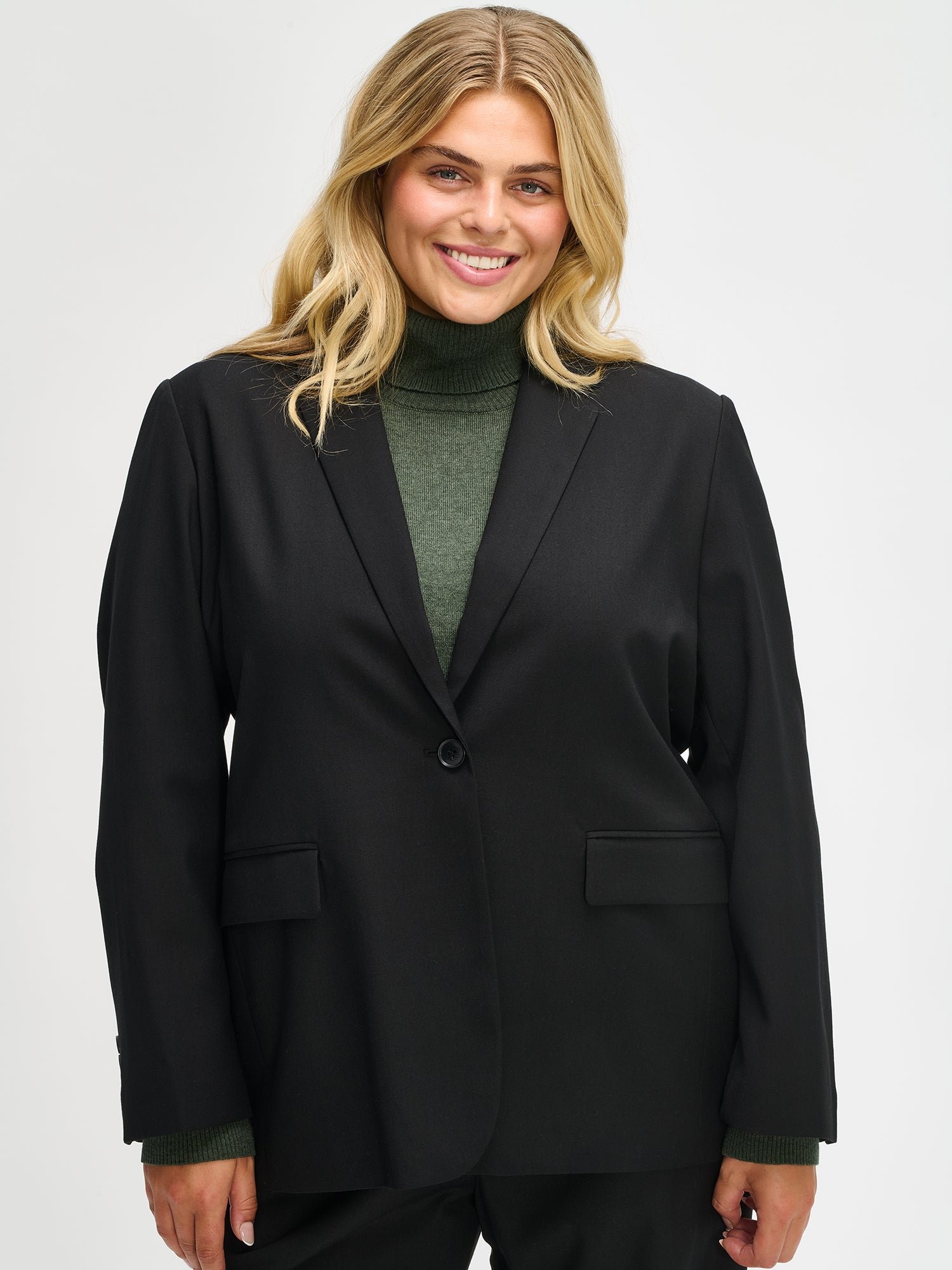 Nanso's black Bea blazer is a timeless and elegant wardrobe essential for women, front, close-up