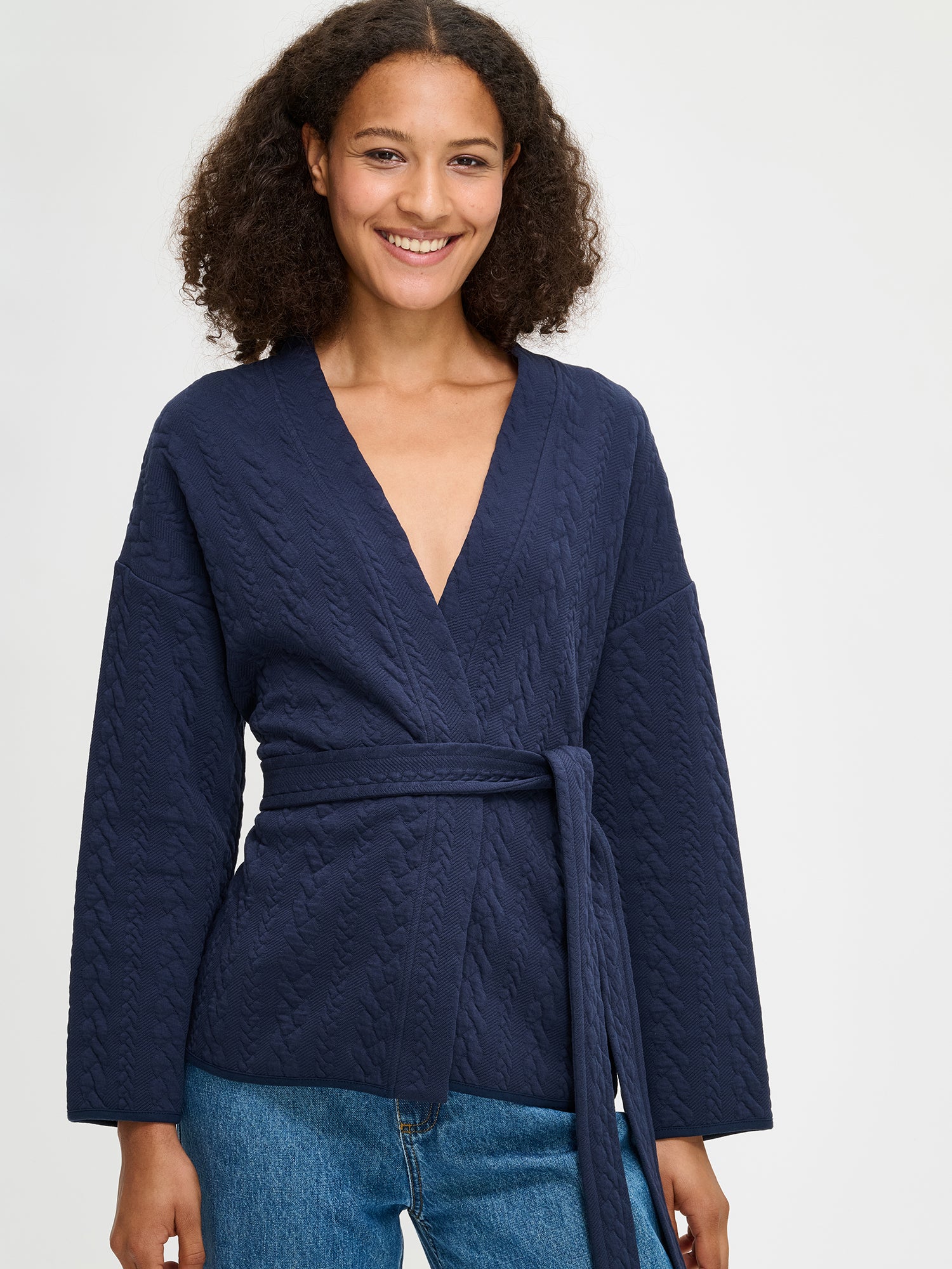 Nanso women's dark blue Letti cardigan features a detachable belt and long sleeves. Size S