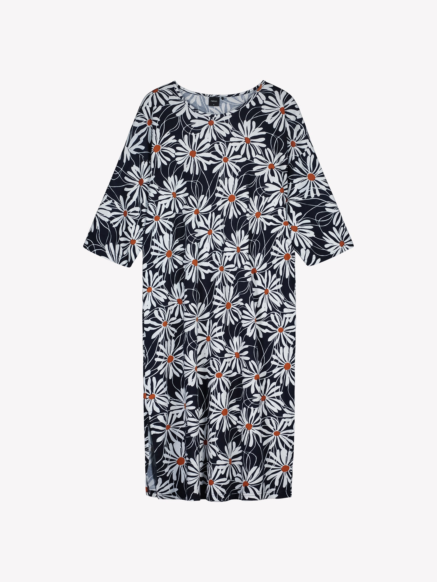 Blue kaftan with white floral pattern in a product picture.