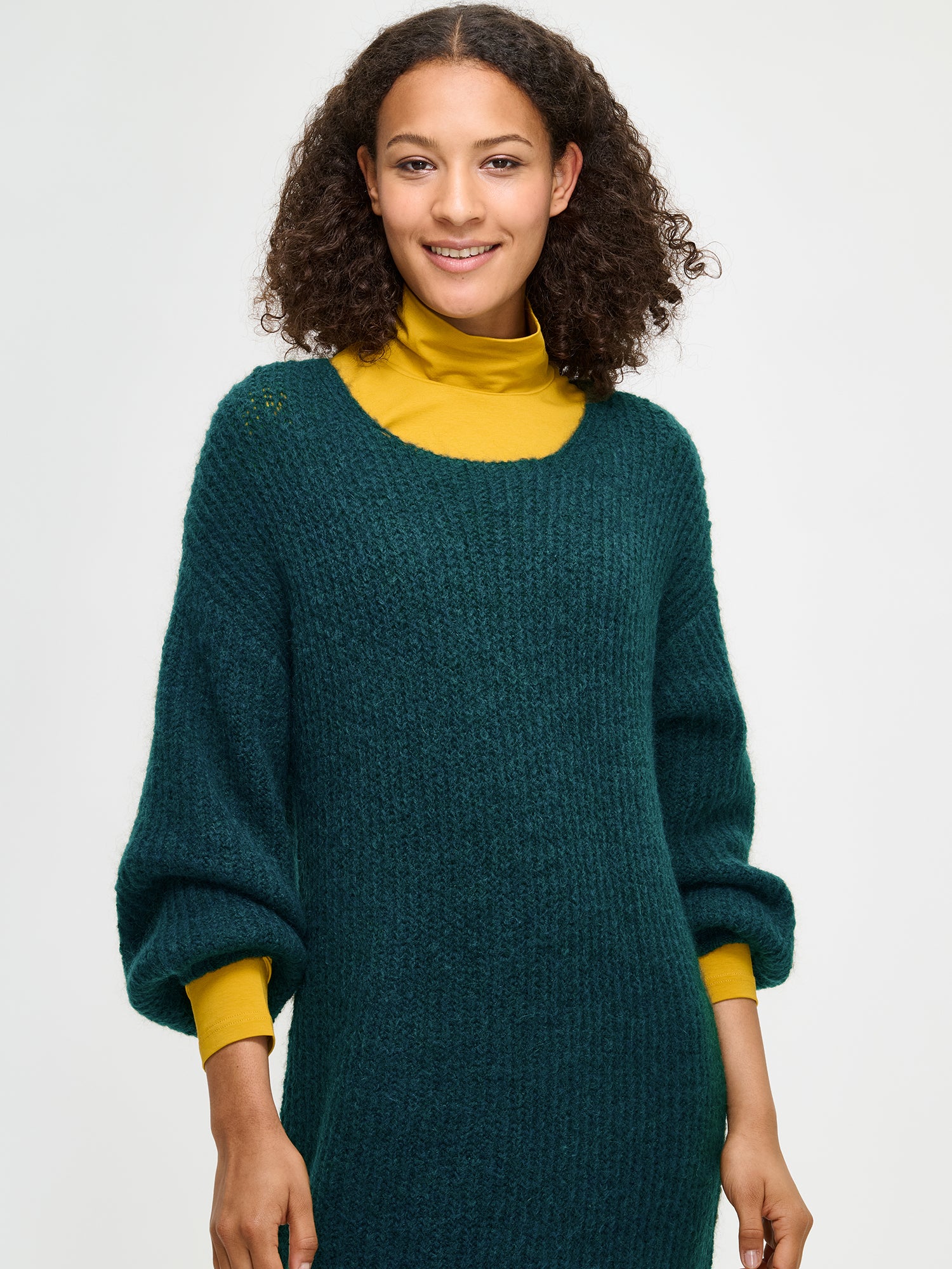 Nanso's luxurious green Karamelli knit dress