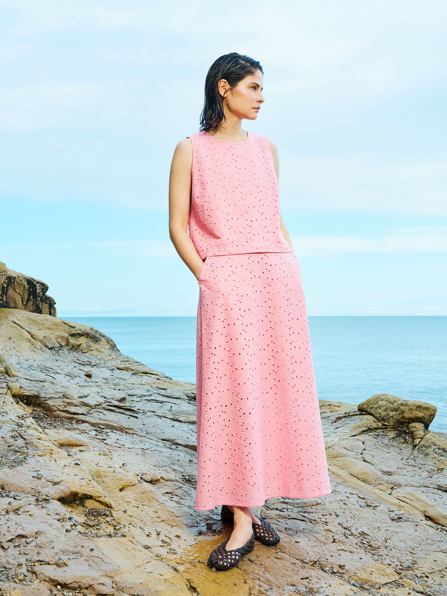 Nanso women's lovely NUPPU Embroidered Blouse in light pink on a model with a matching skirt