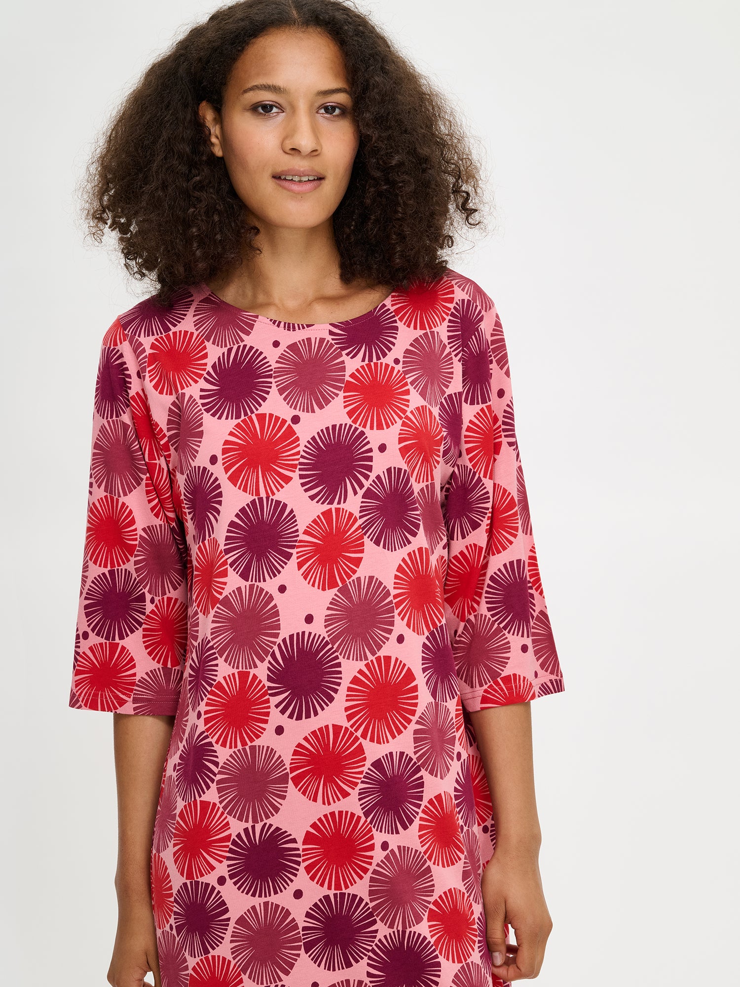 Nanso Amara red women’s long nightgown with 3/4 sleeves and oval neckline, calf-length, worn by model.