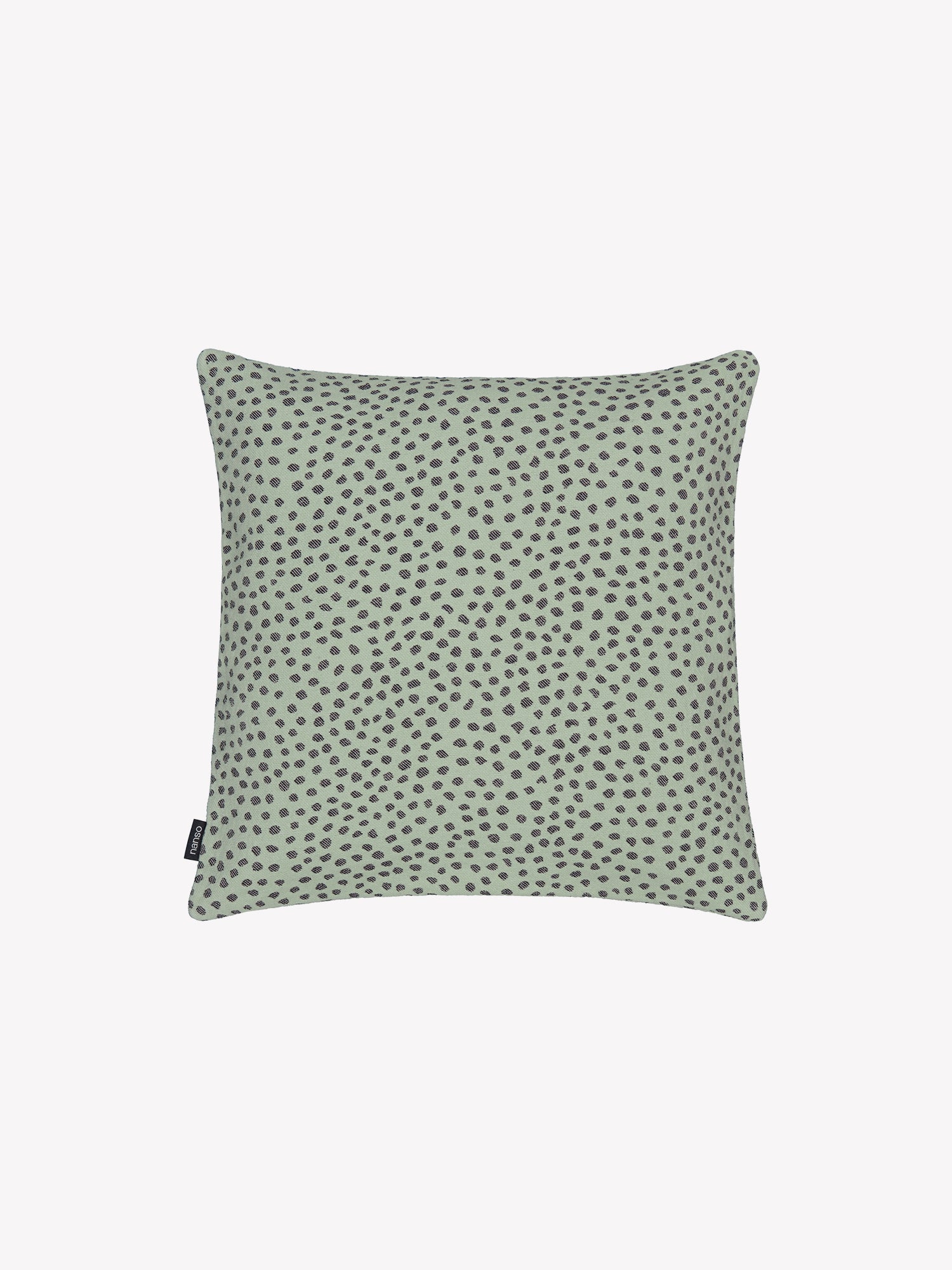 Muru pillowcase in mint features delicate black polka dots, product picture