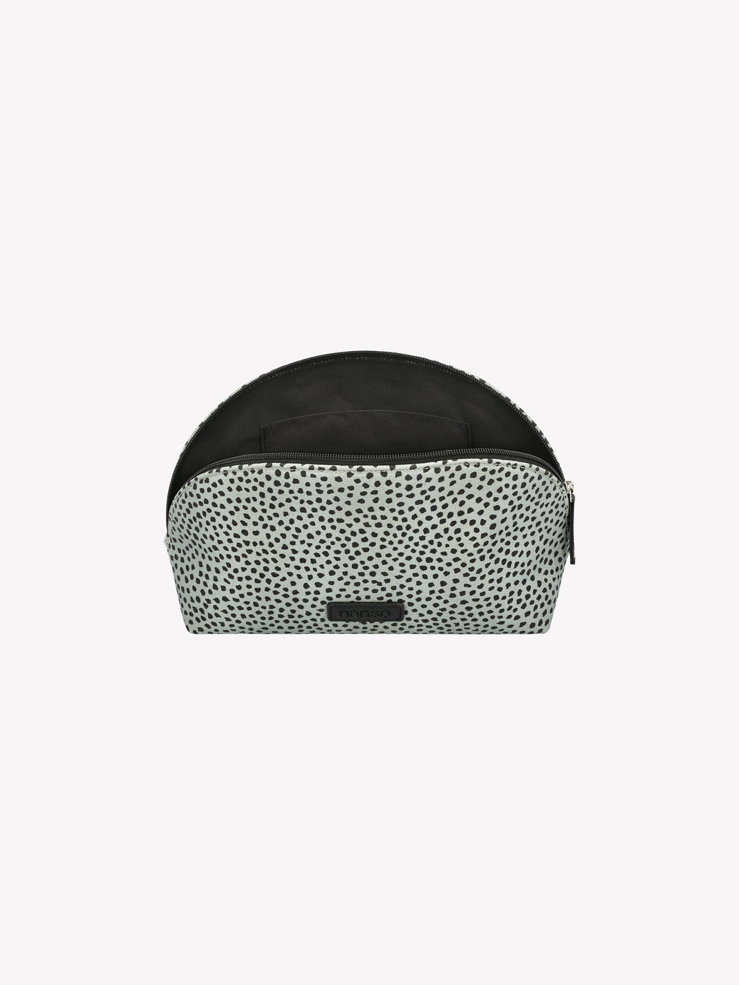 Nanso's Muru cosmetics bag in mint in a product picture, with thr zip opened.