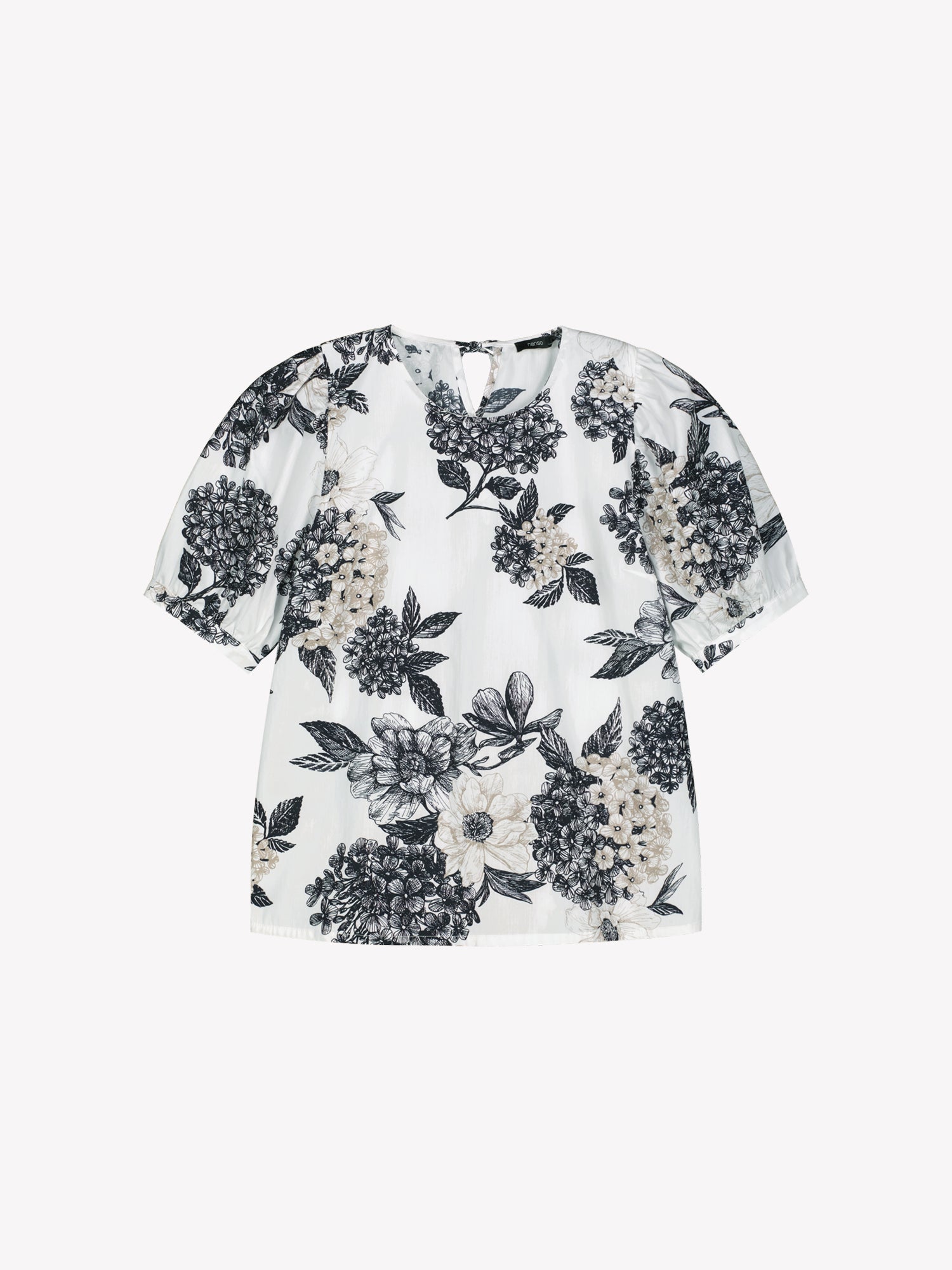 Nanso Palatsi blouse features a delicate floral pattern in black and white, product picture.