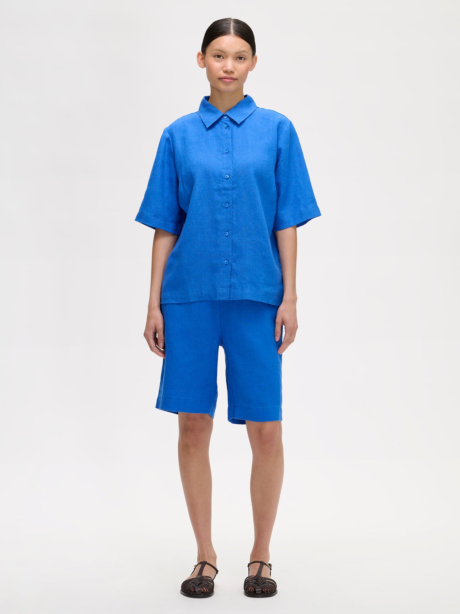 Nanso women's relaxed blue Liine linen shirt, crafted from breathable linen on a model with matching shorts