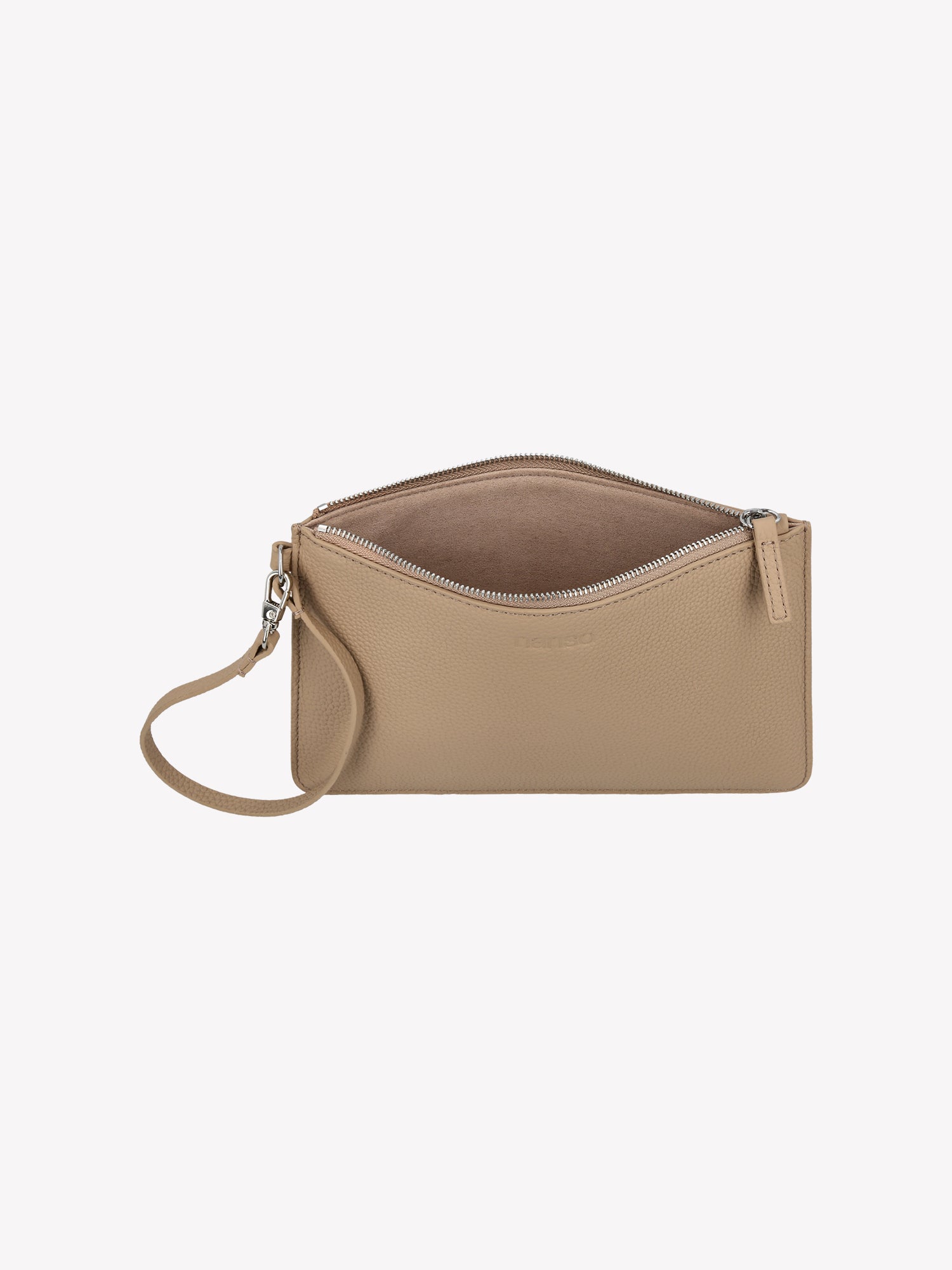 Nanso light beige Naru Pieni Bag works as both a wallet and a small bag. The bag's short strap can also be attached to a larger Naru bag's strap.
The bag features a metal zipper and the Nanso logo is printed on the front. Product picture from the above.