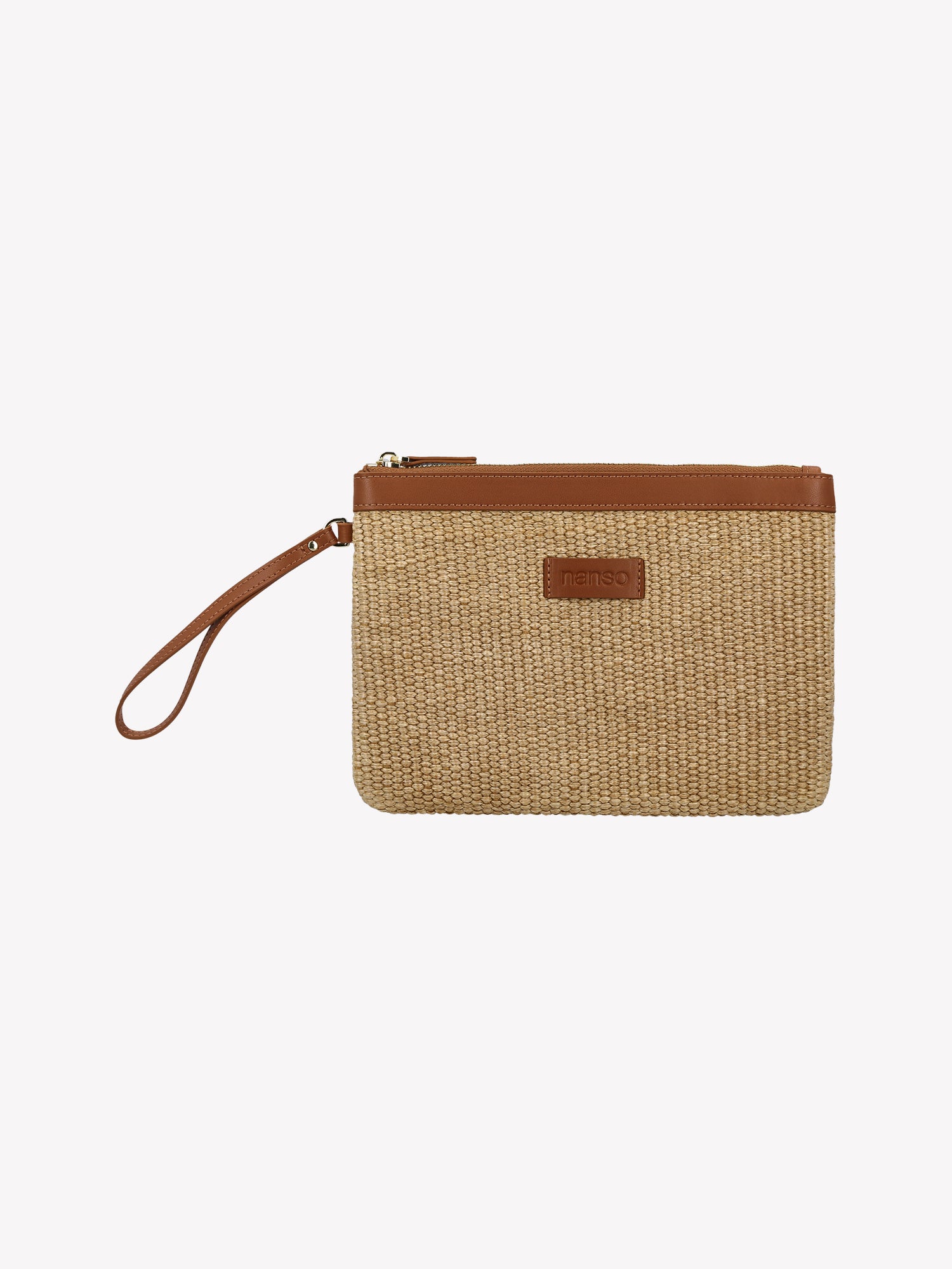A stylish Kori bag in a compact size, crafted from durable straw-like material. This compact bag features a short leather handle and secure zip closure. Product picture from the front.