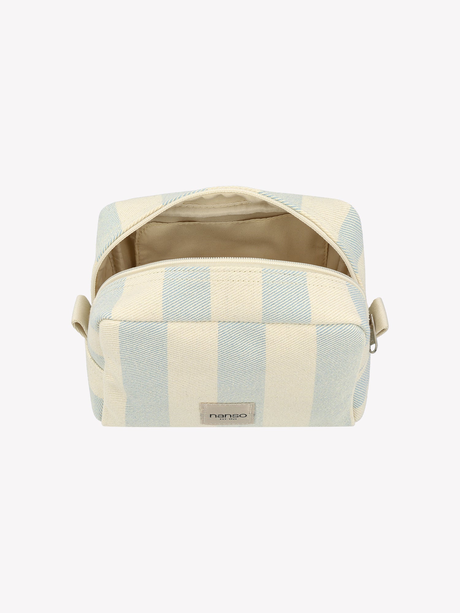 The AMALFI MINI cosmetics bag in Light Blue in a fresh product picture the zipper opened
