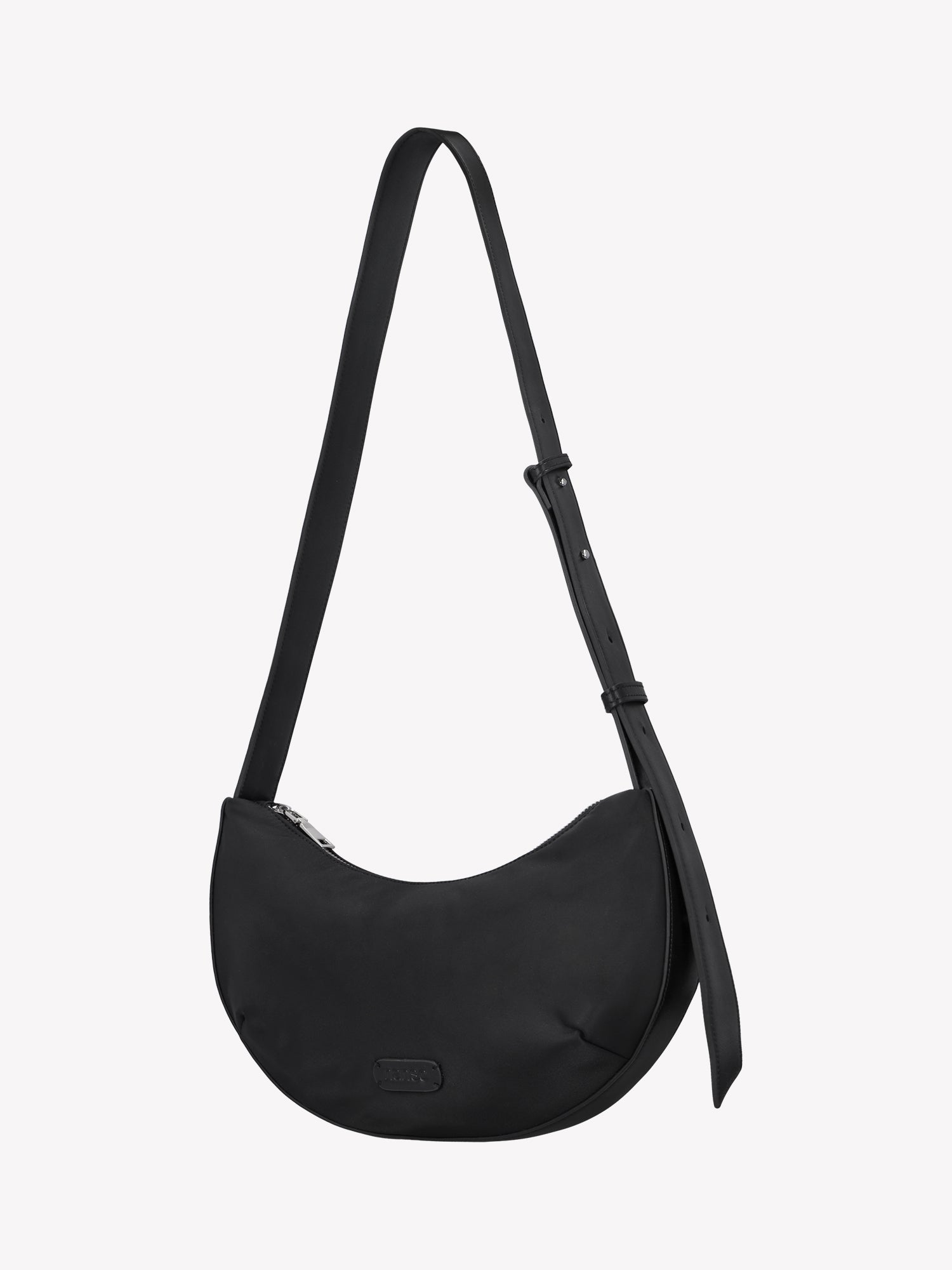 Nanso women's stylish black half moon shaped crossbody bag crafted from durable nylon, product picture.
