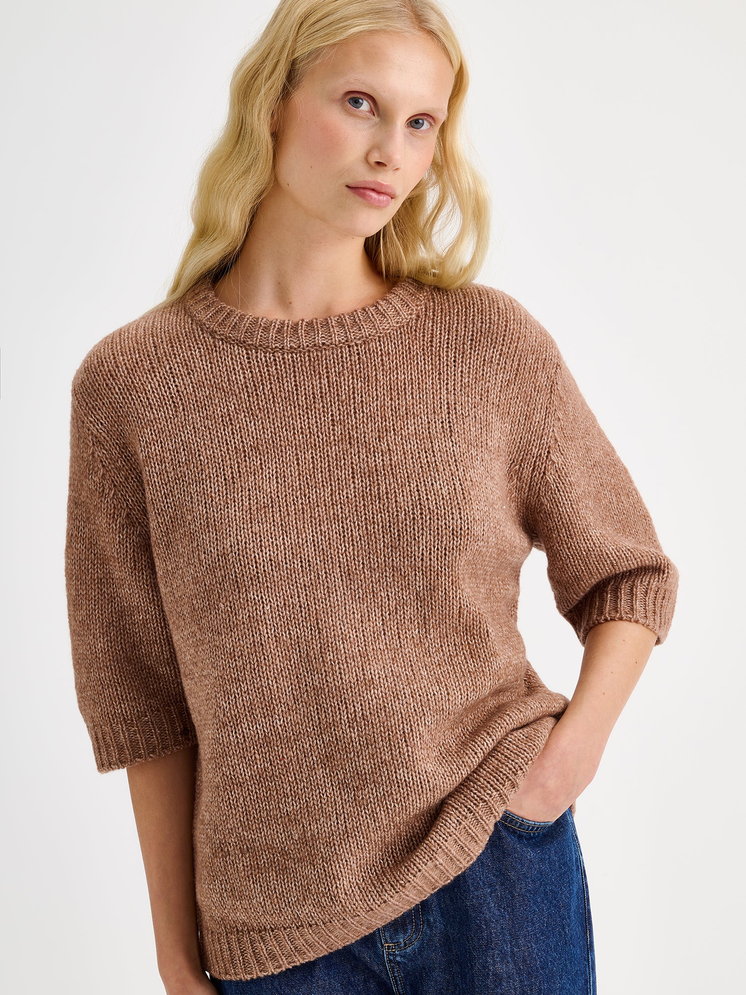 Nanso womens knit sweater Moriko in warm brown, on a model with jeans