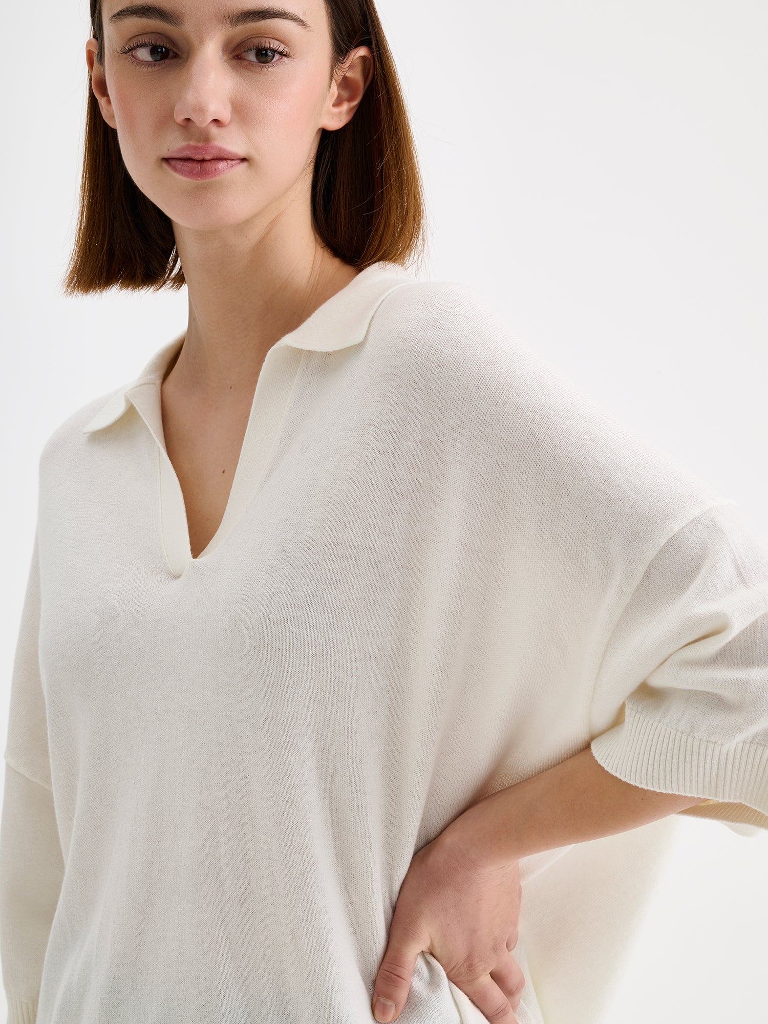 Nanso women's natural white, timeless Villis knit sweater with collar details on a model