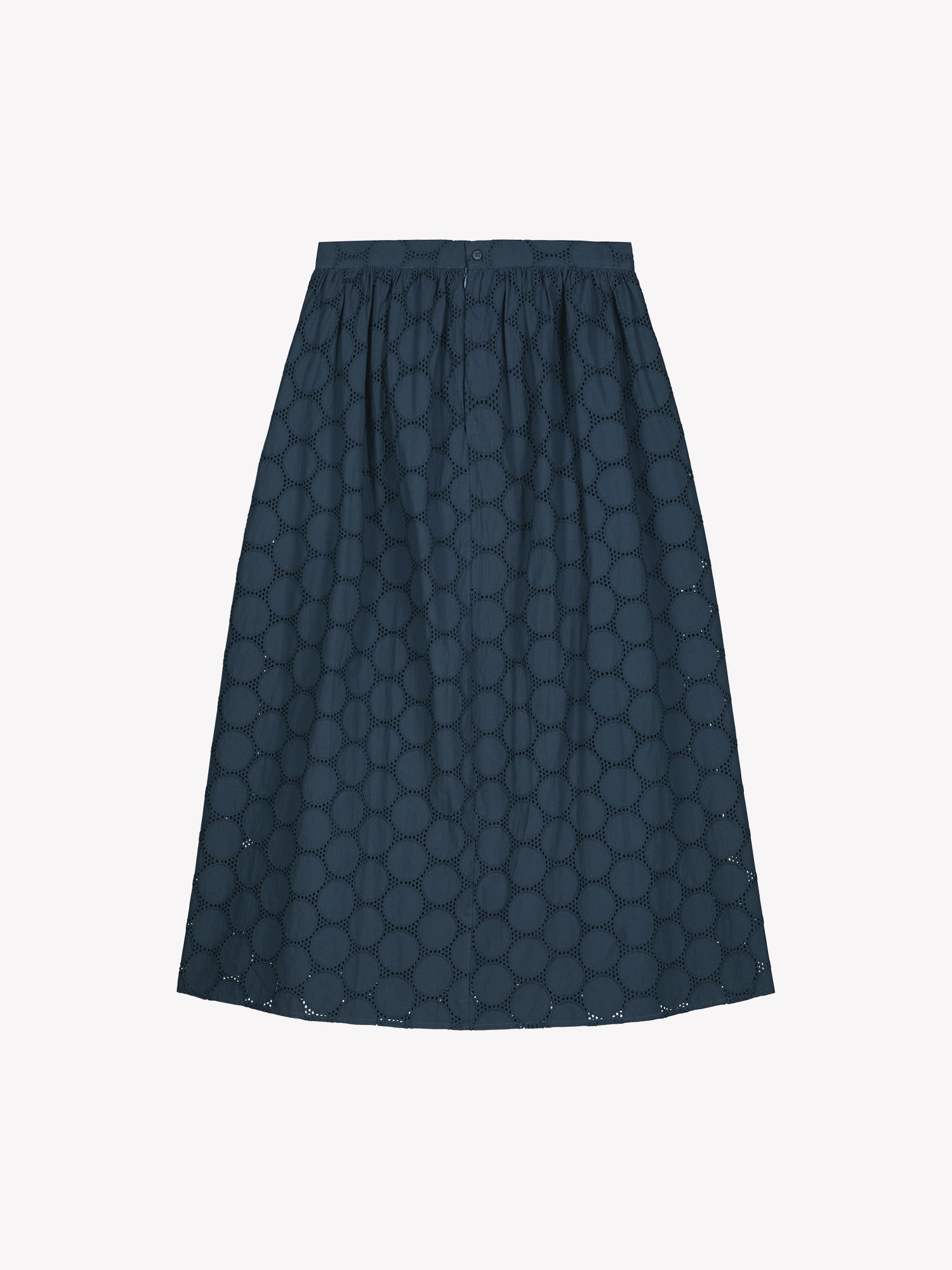 Nanso women's dark blue Siiri midi skirt, featuring a delicate lace-like woven cotton fabric with beautiful texture, pockets and a zip, in a product picture from the backside