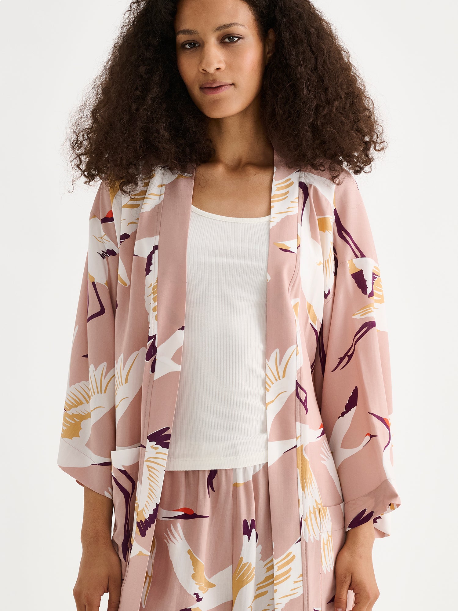 Nanso women's beautiful and comfortable KURKI robe featuring a striking and charming pale pink pattern, on a model