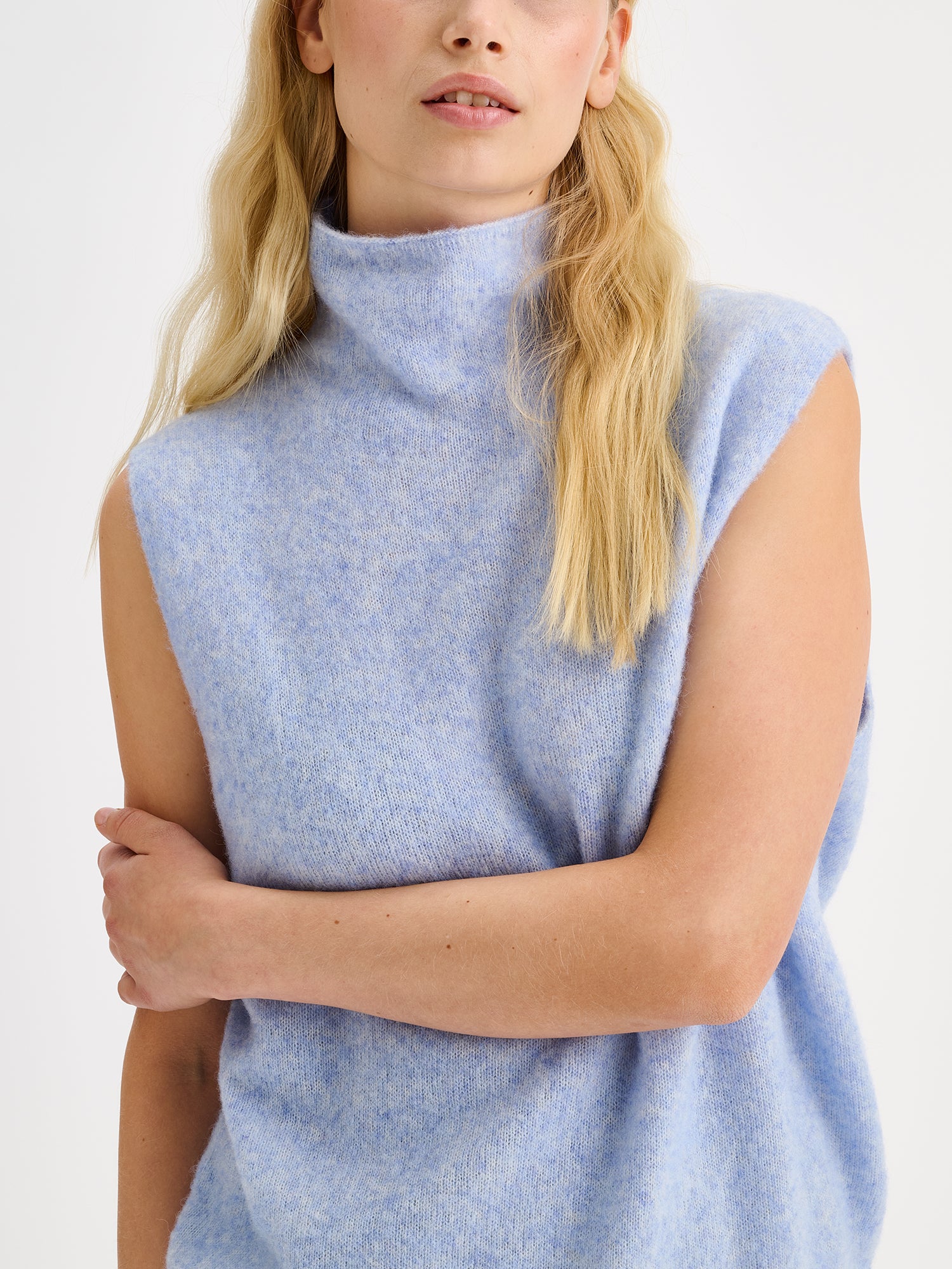 Nanso women's relaxed and wonderfully lightweight Alina knit vest with a high neckline on a model with close-up