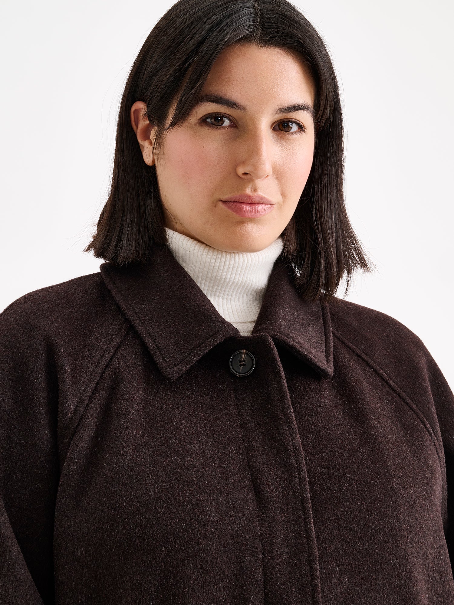 Nanso women's timelessly elegant and effortlessly classic, the Tove long wool coat, on a model close-up