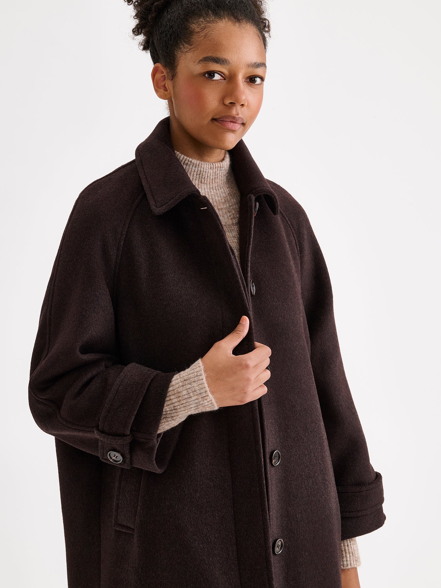 Nanso women's timelessly elegant and effortlessly classic, the Tove long wool coat, on a model close-up