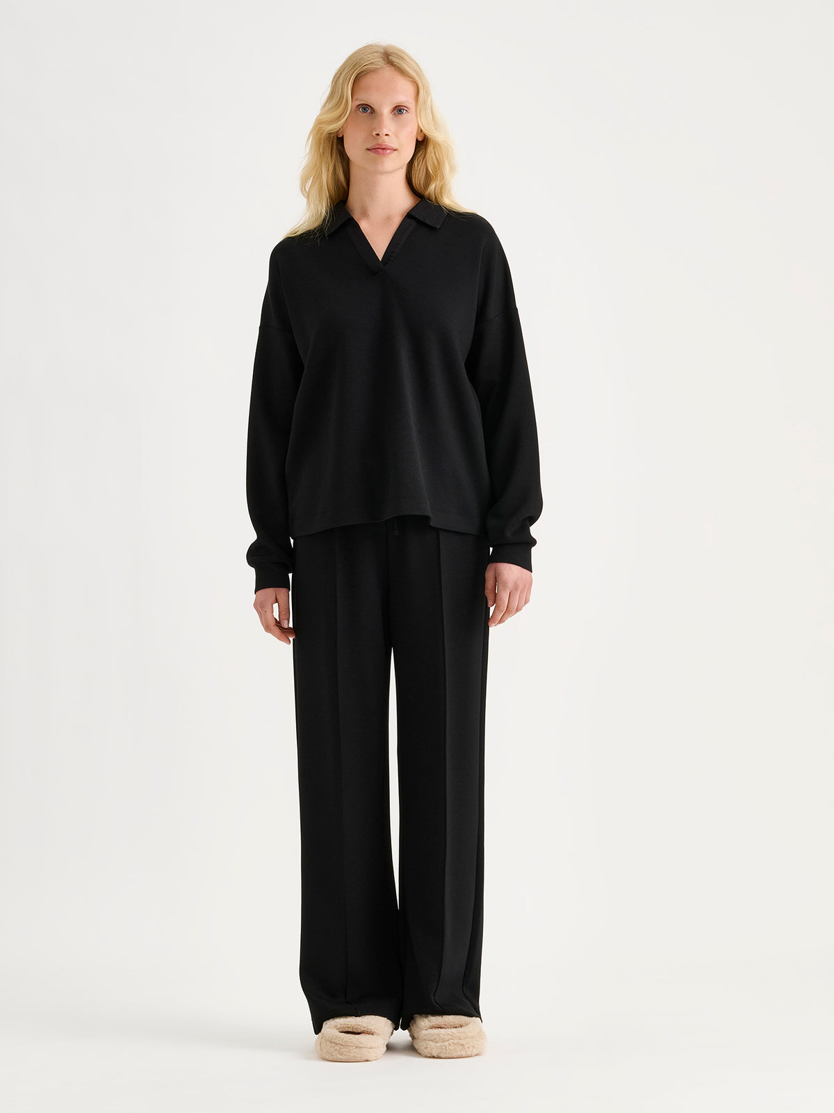 Nanso women's elegant black Aurelia lounge pants with wide legs combine comfort with a polished look.