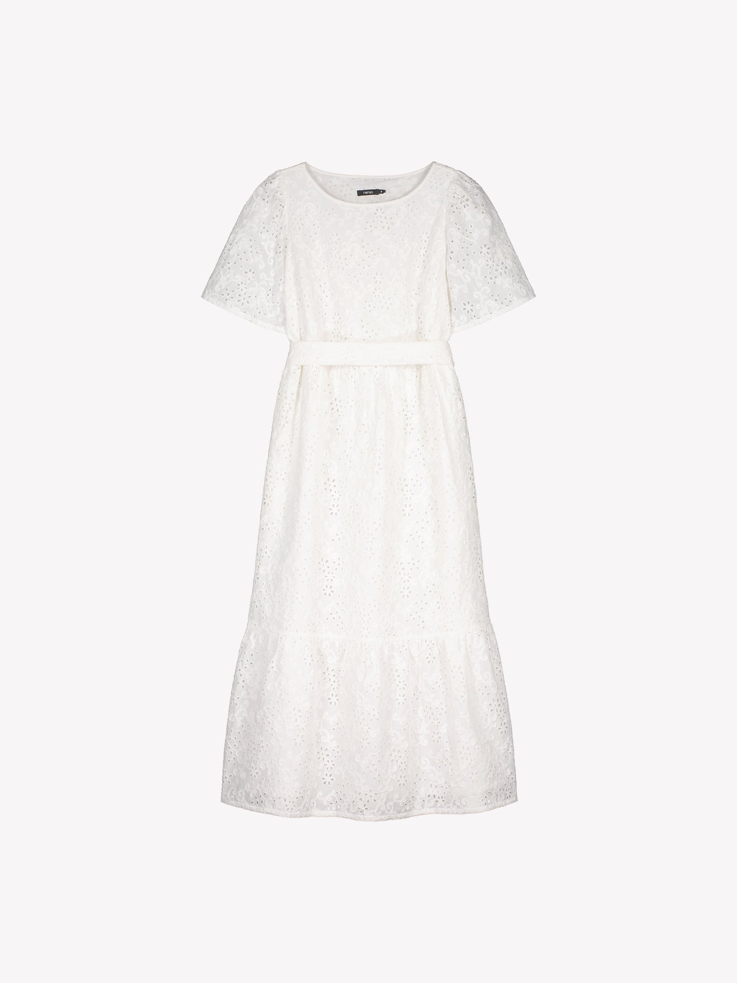 Nanso women's beautiful long soft white Odette dress crafted from delicate broderie anglaise style cotton fabric with a lace-like texture in a product picture.