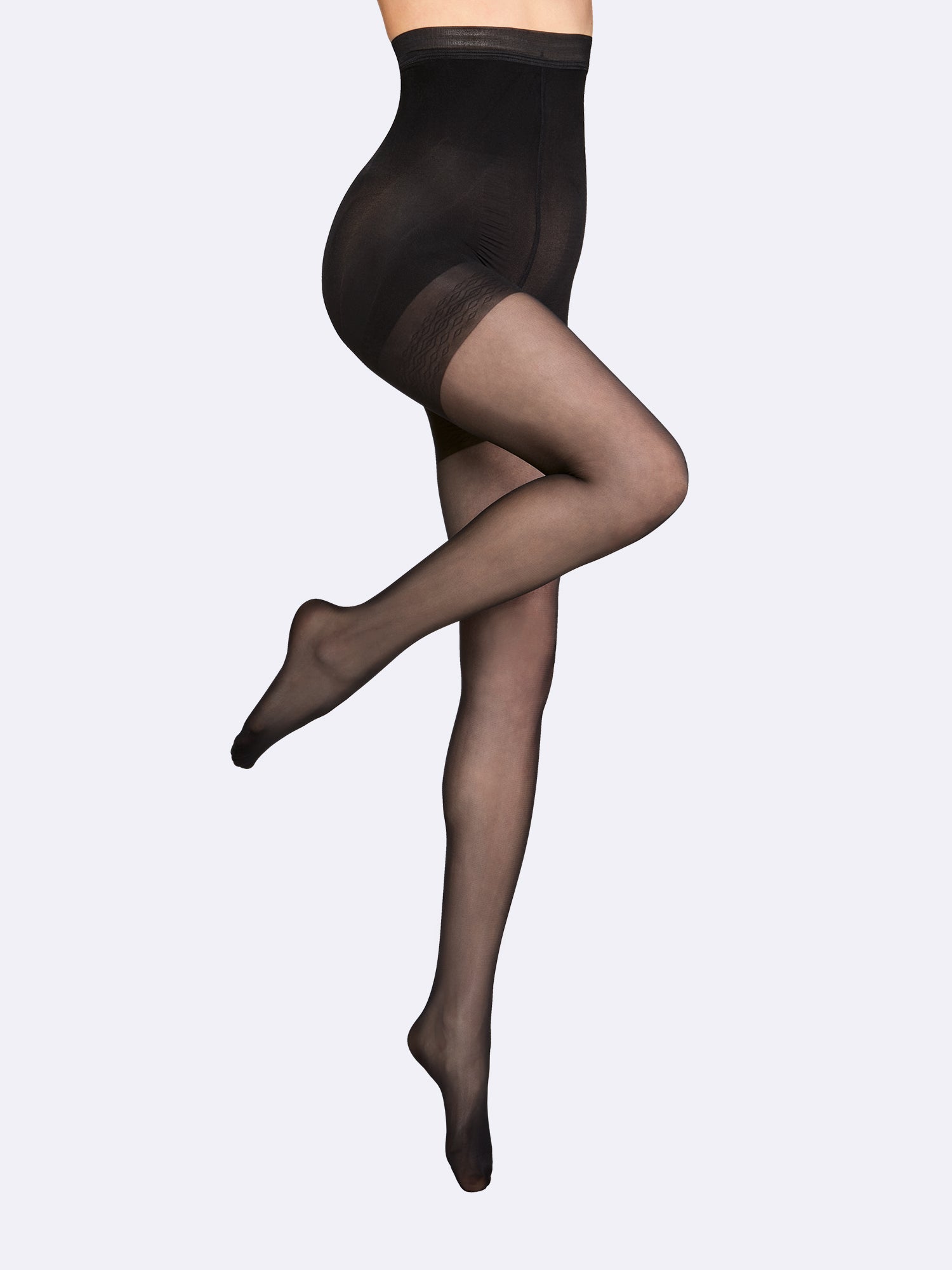 Vogue women's pair of Control Top tights in black will shape your body with its high waistline and 50 den Control Top panty, on model.