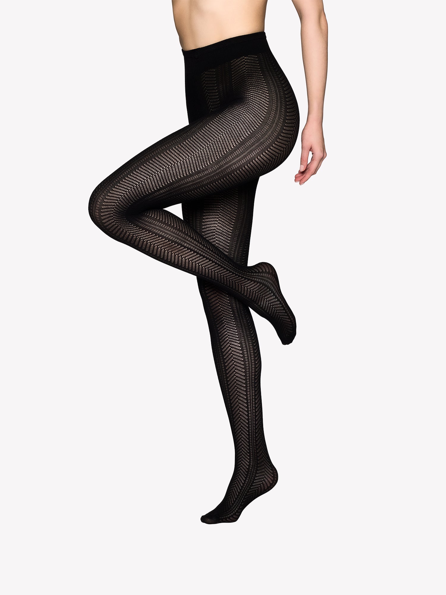 Vogue's sheer JILLIAN tights in black with a lace pattern in a product picture.