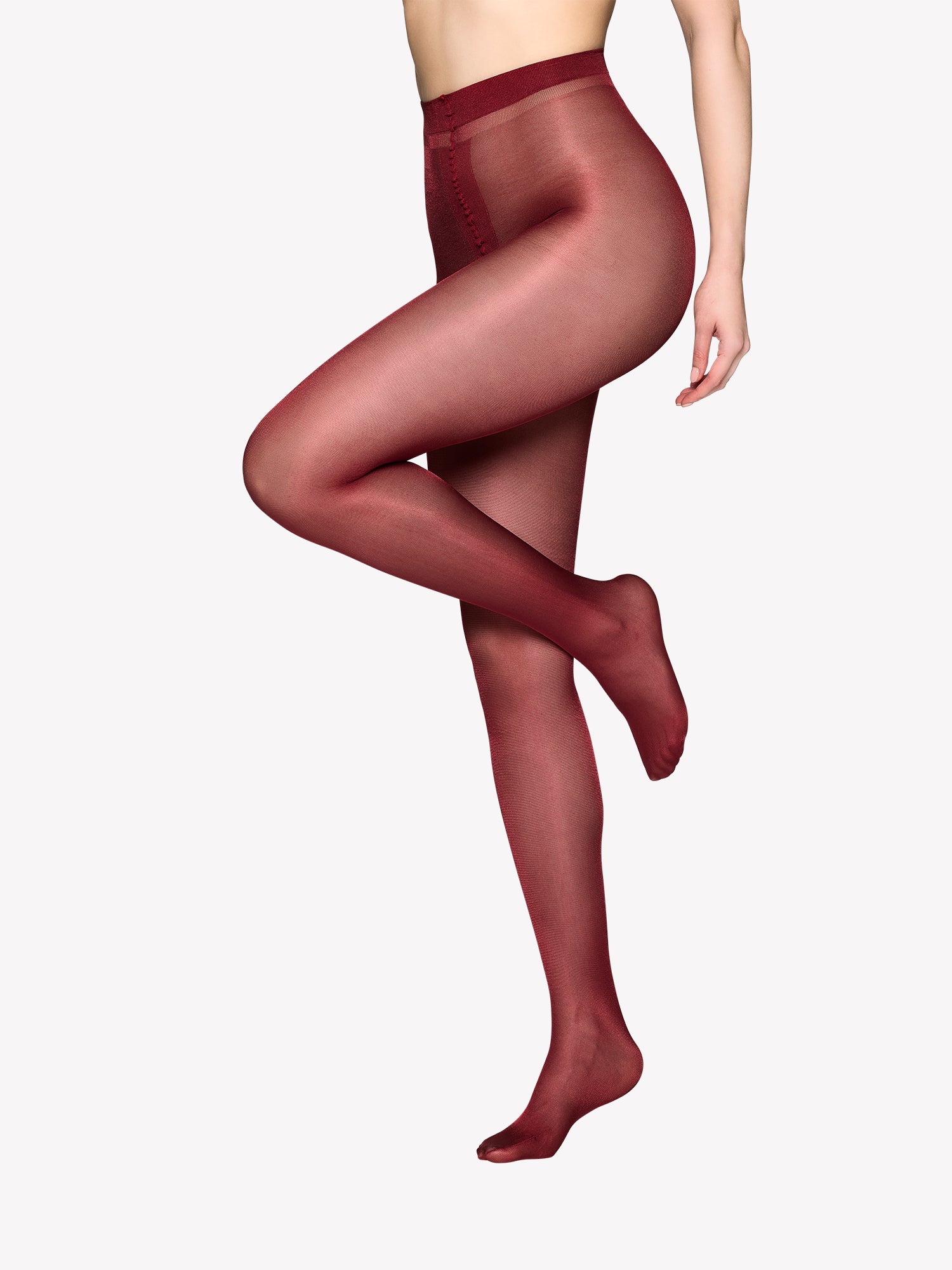 Vogue’s Giselle 40 denier shimmering rosewood tights in a product image.