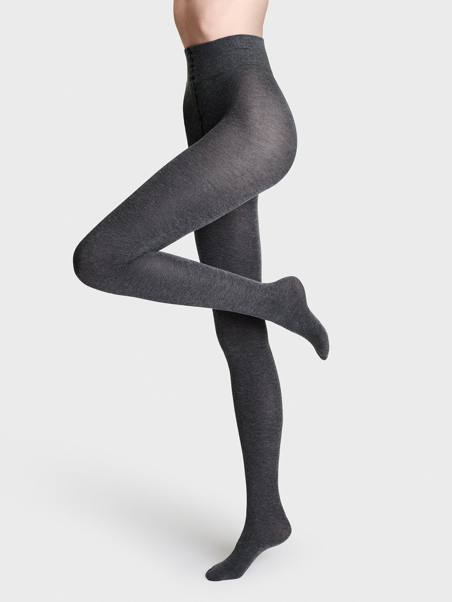 Luxuriously soft classic grey cashmere-blend tights, on a model